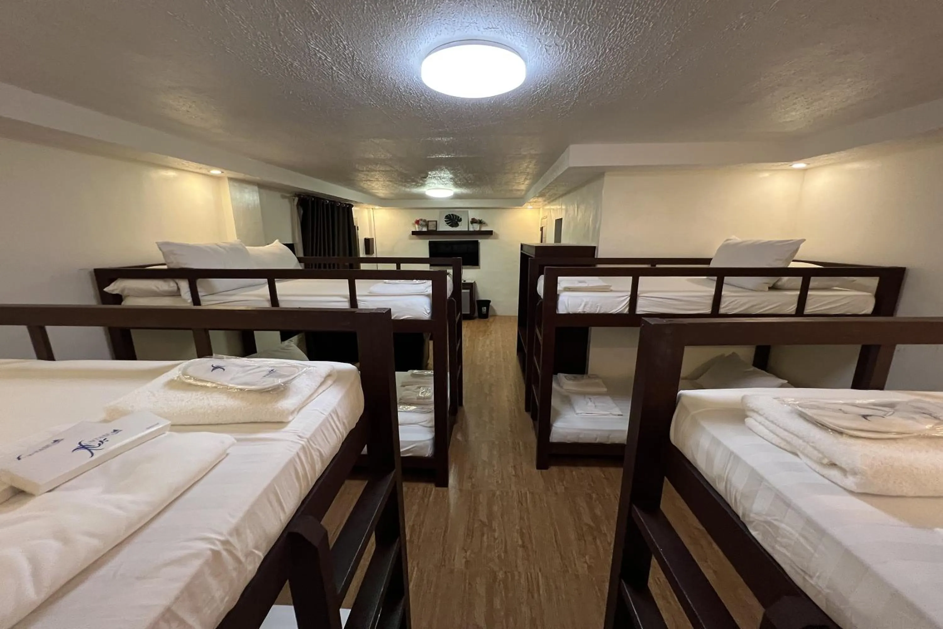 Bed in Funtasea Hotel and Beach Resort