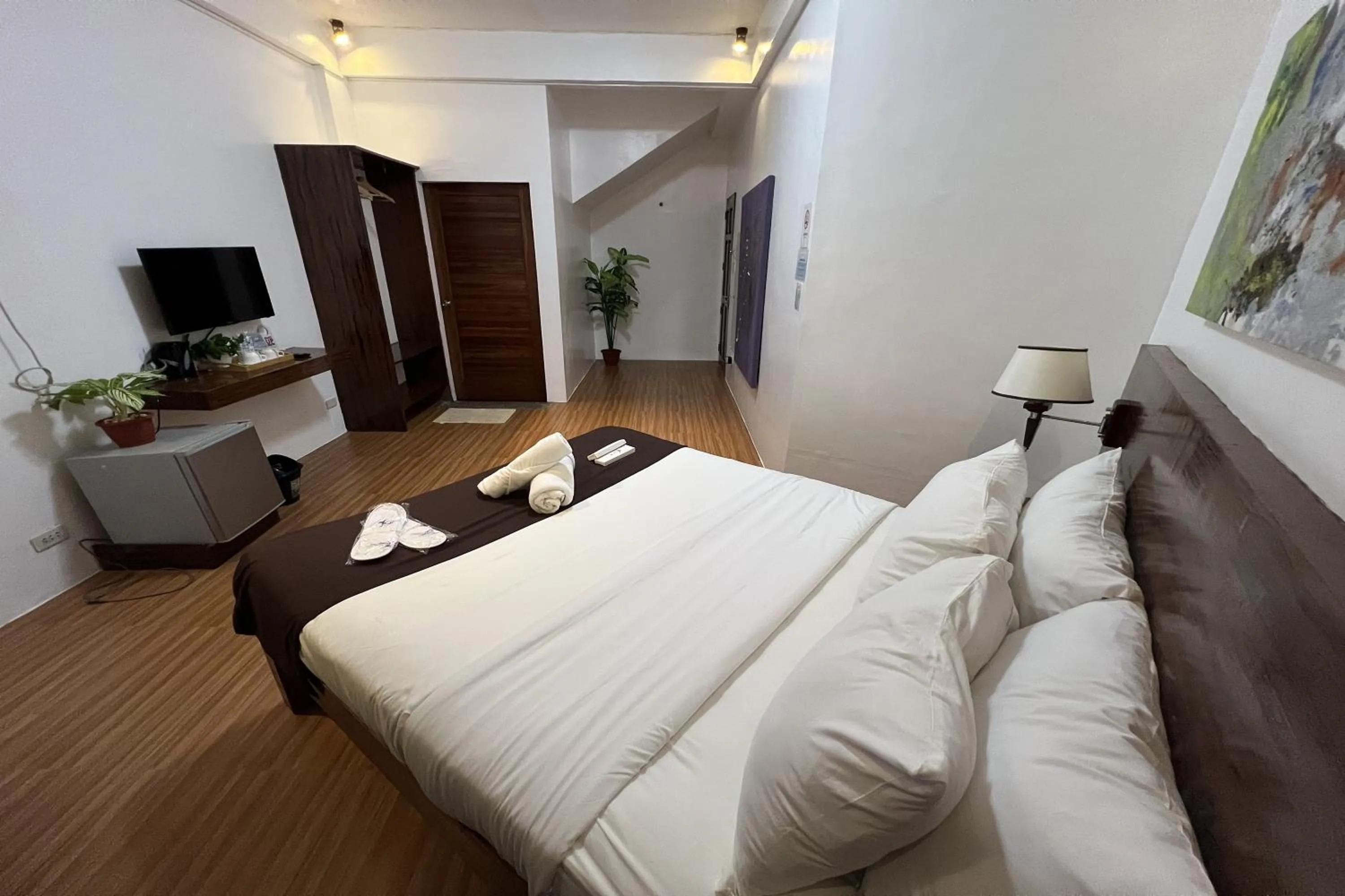 Bed in Funtasea Hotel and Beach Resort