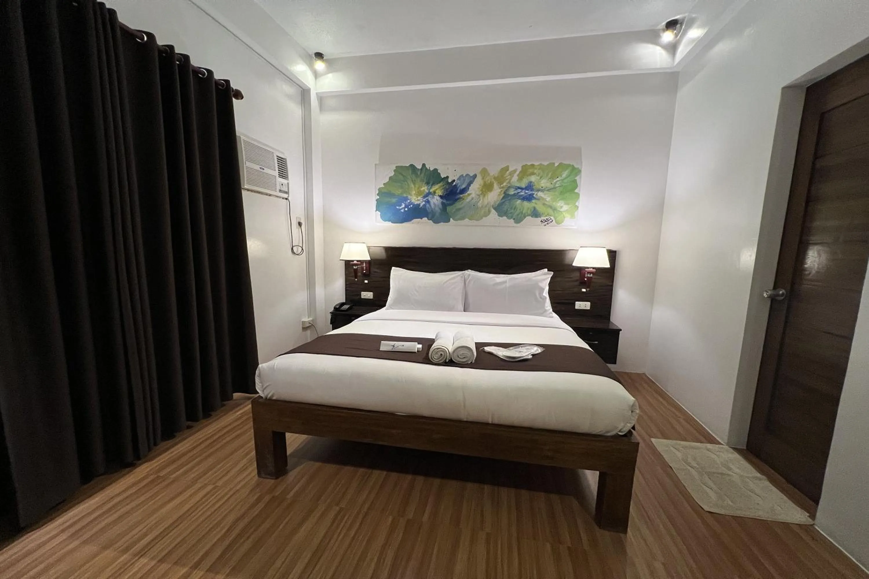 Bed in Funtasea Hotel and Beach Resort