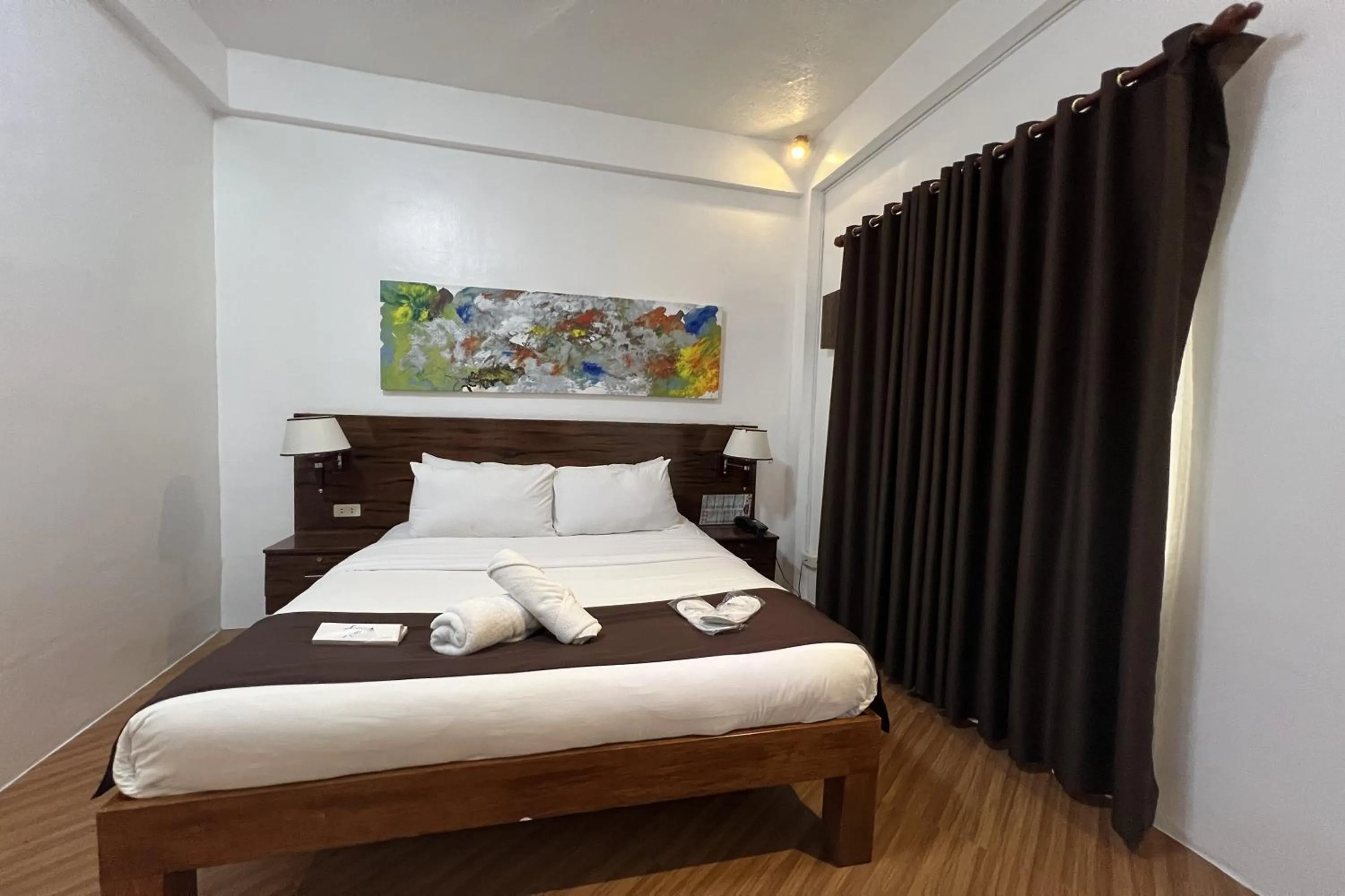 Bed in Funtasea Hotel and Beach Resort