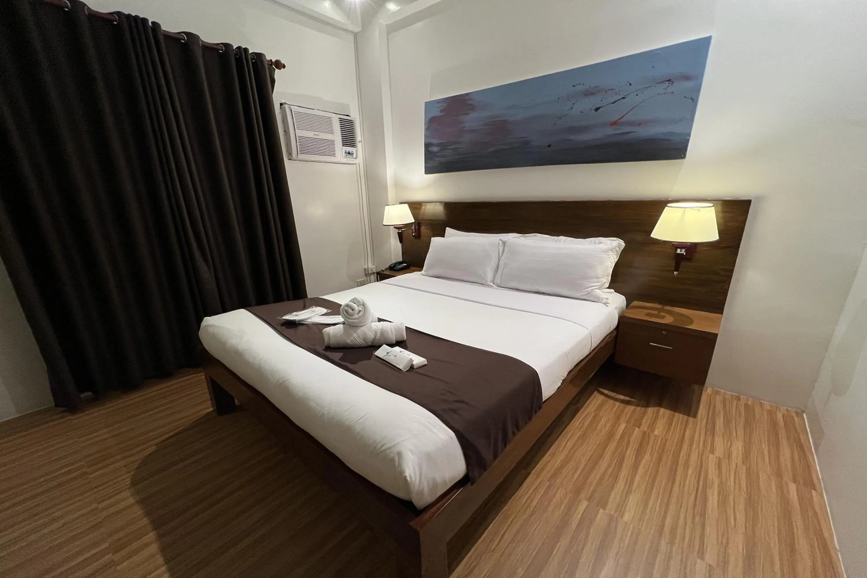 Bed in Funtasea Hotel and Beach Resort