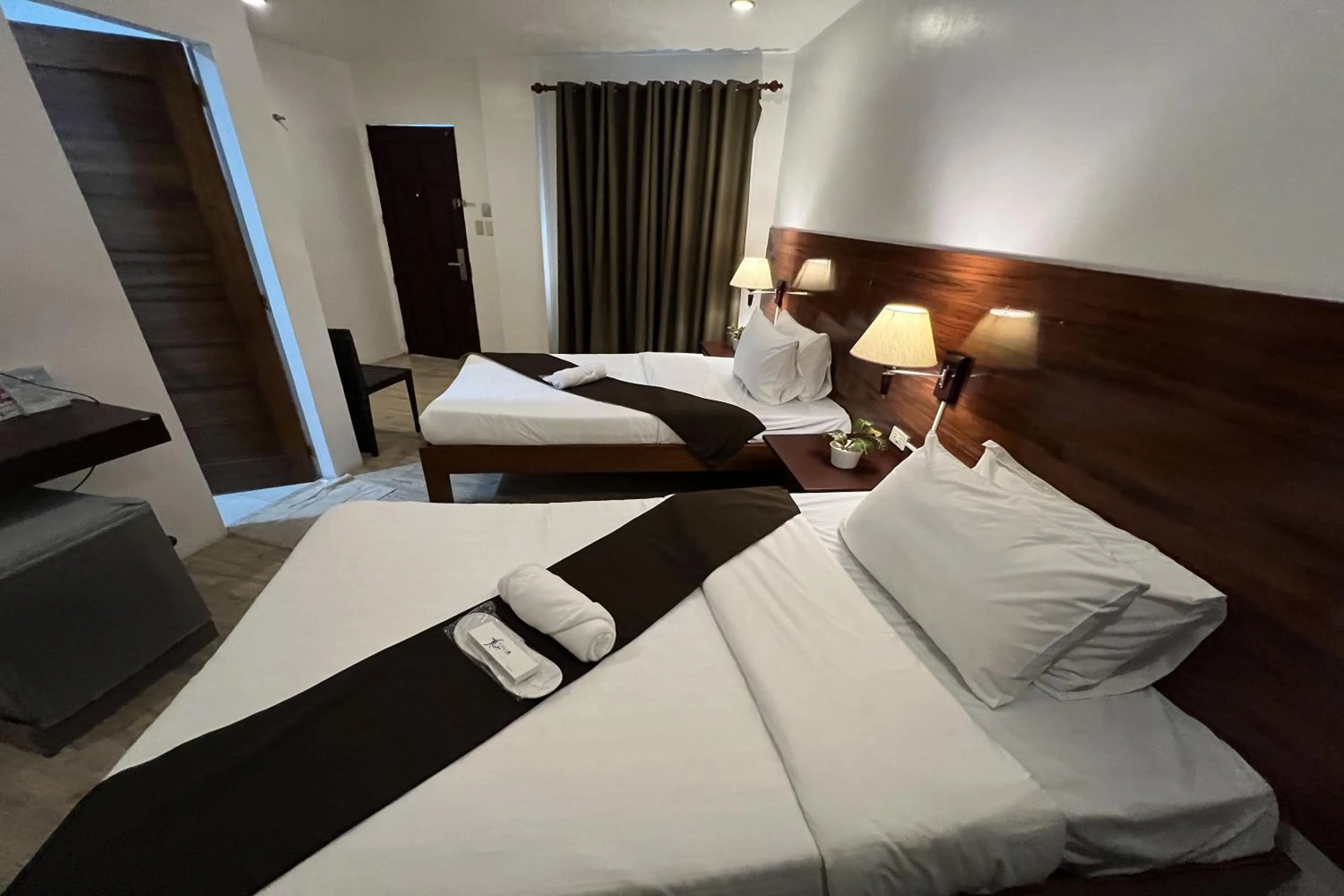 Bed in Funtasea Hotel and Beach Resort