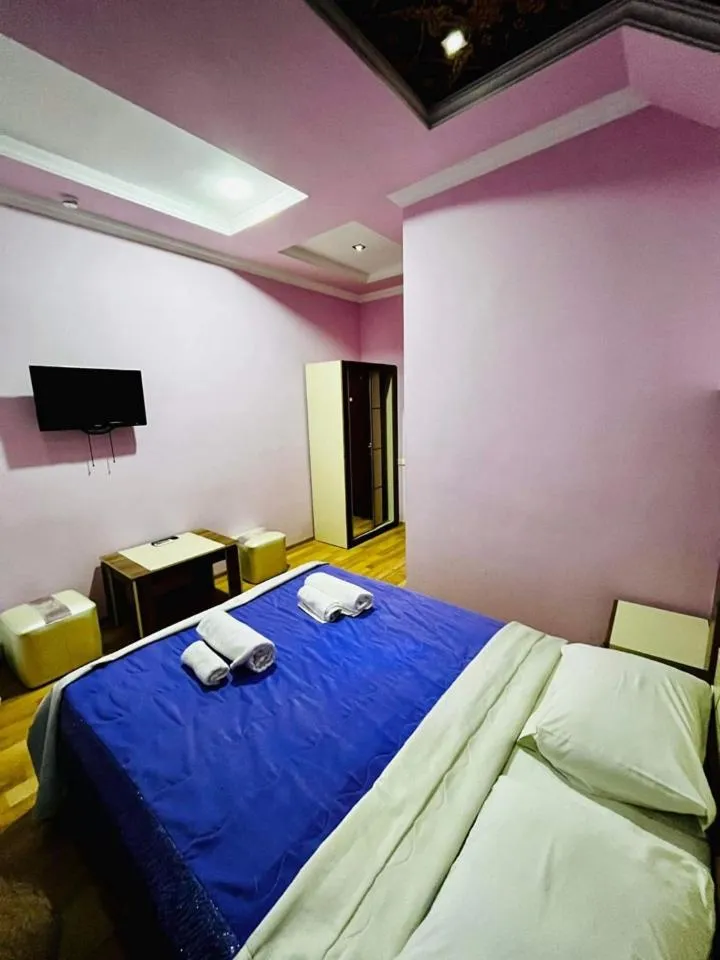 Bed in Lux Palace Hotel