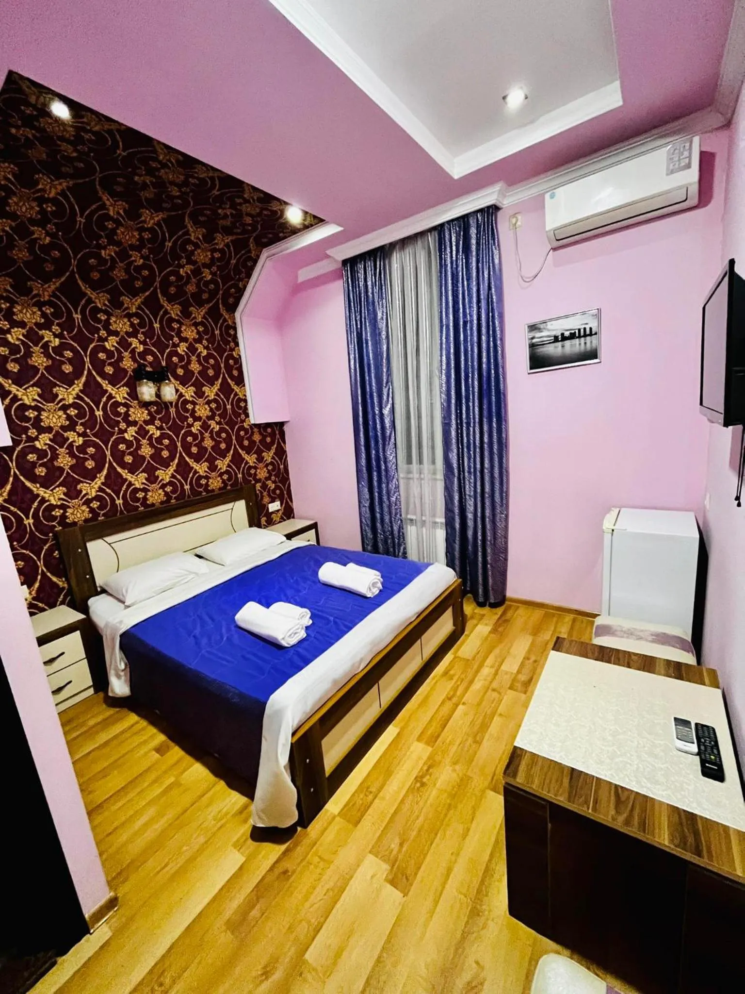 Bed in Lux Palace Hotel