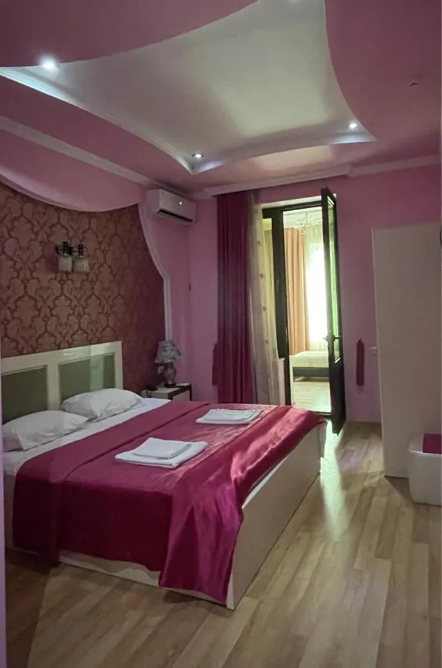 Bed in Lux Palace Hotel