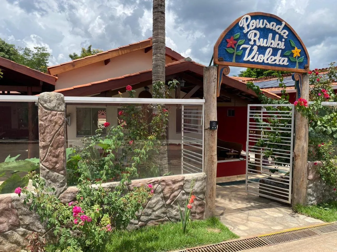 Logo/Certificate/Sign in Pousada Rubbi Violeta