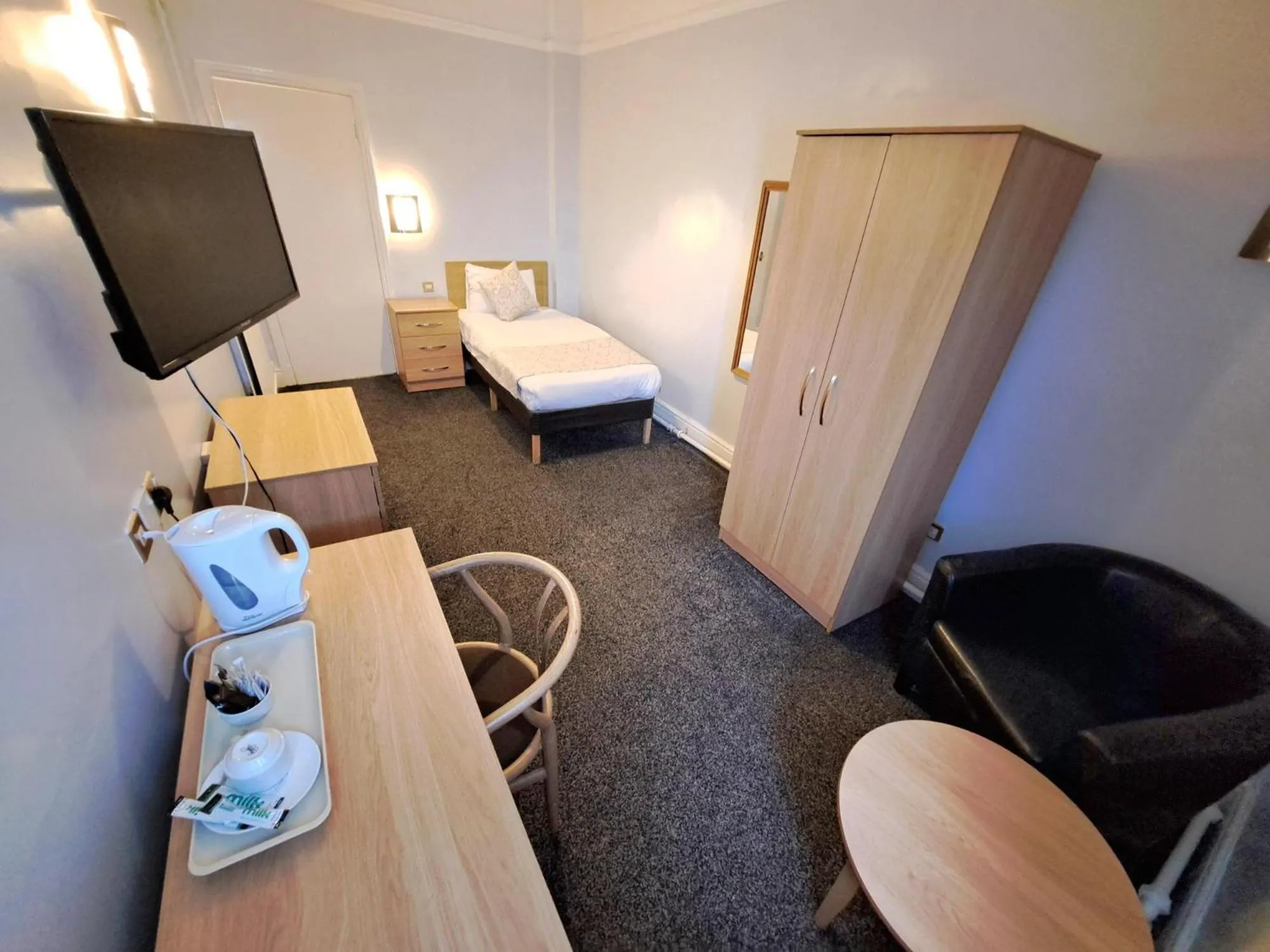 Bed in Prince Of Wales Hotel