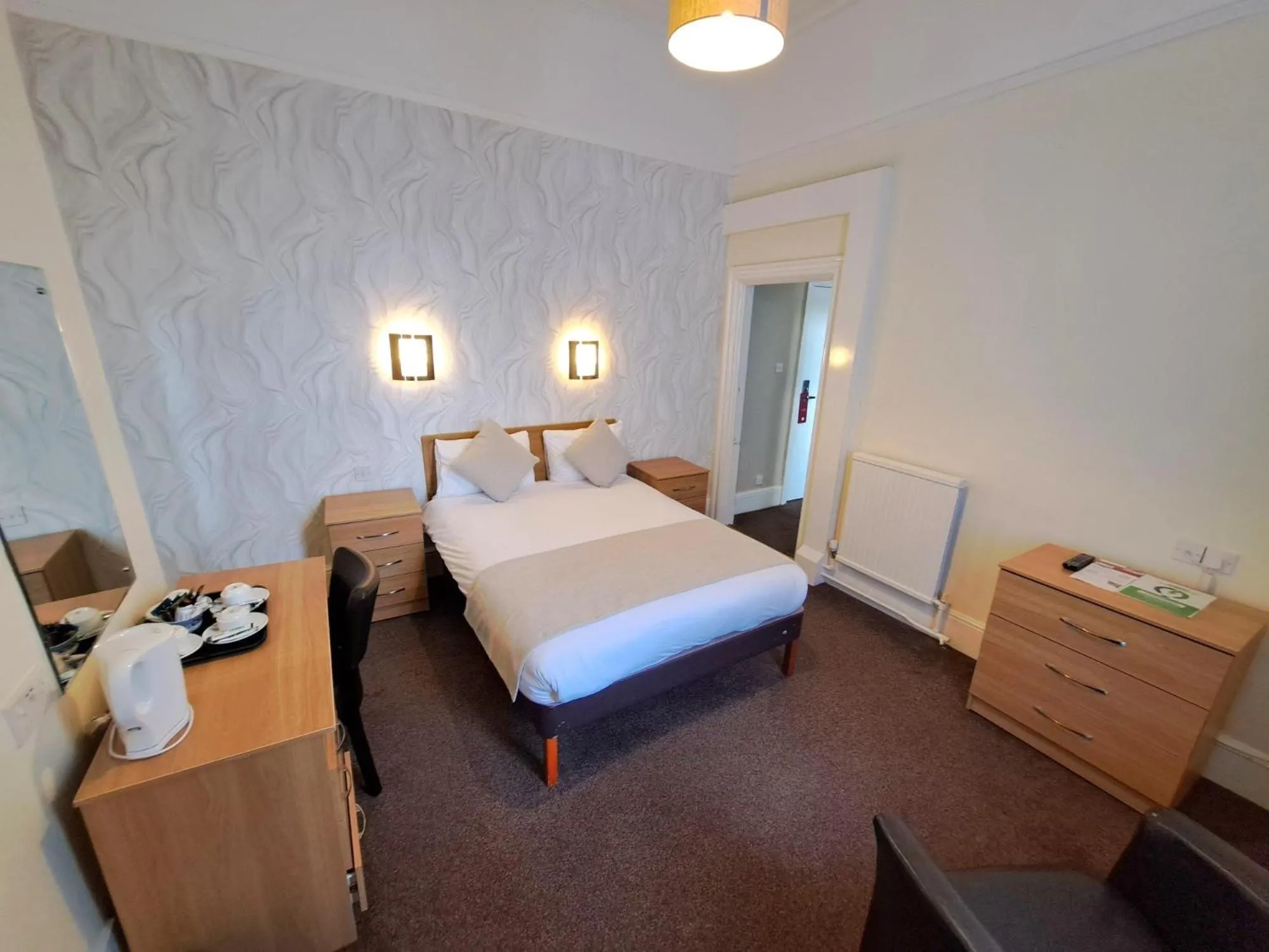 Bed in Prince Of Wales Hotel