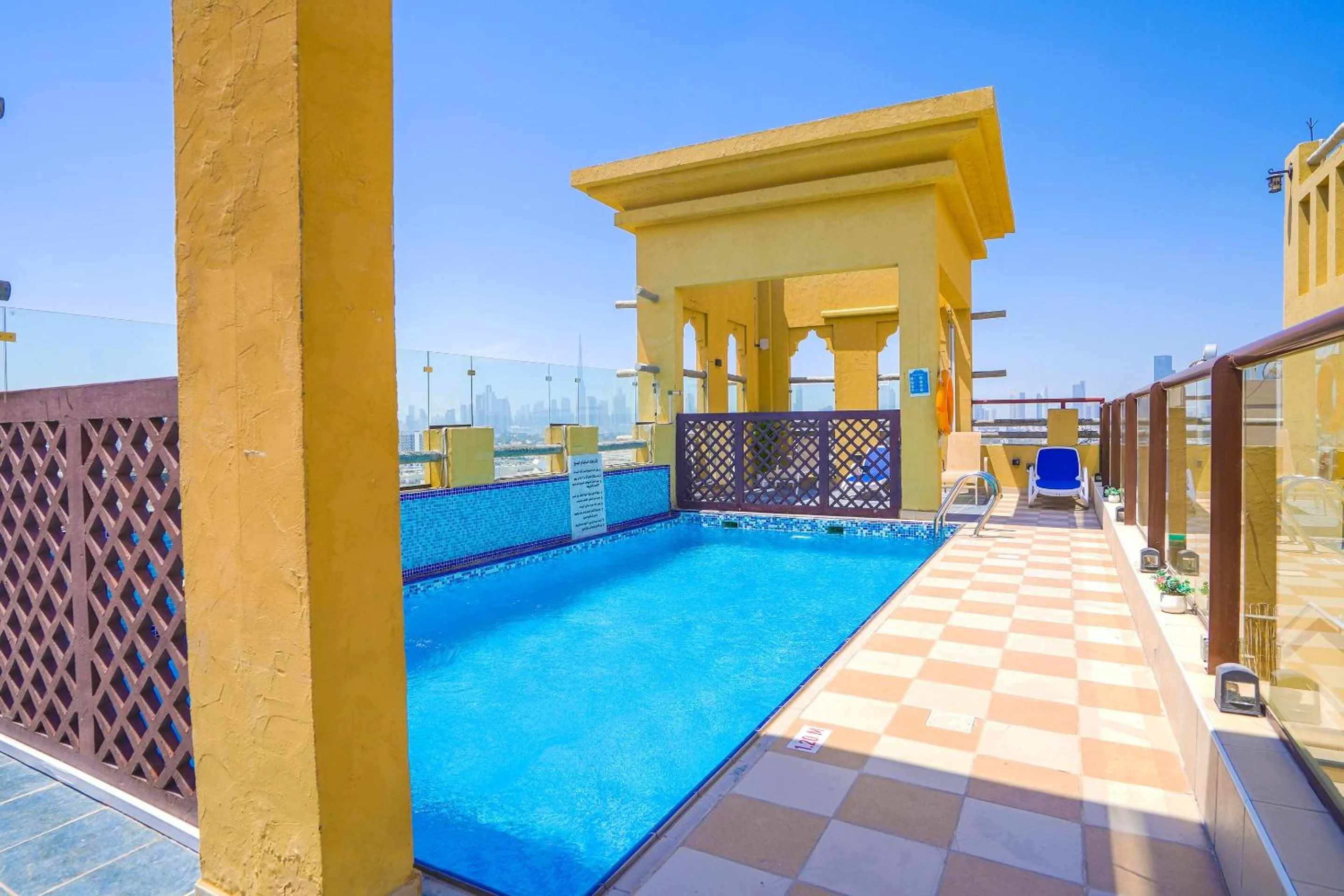 Swimming pool in Palette Royal Reflections Hotel and Spa Dubai