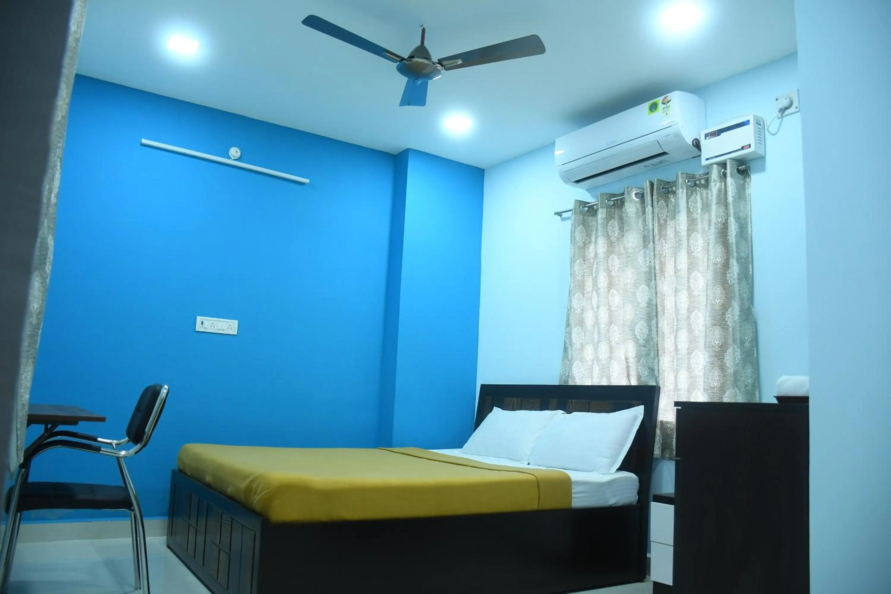 Bed in Thendral Park Inn