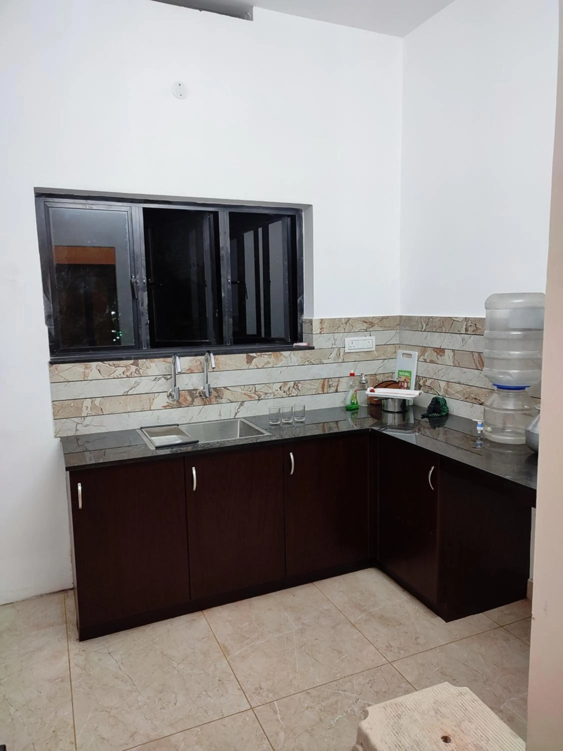 Kitchen or kitchenette in Alam Home Stay