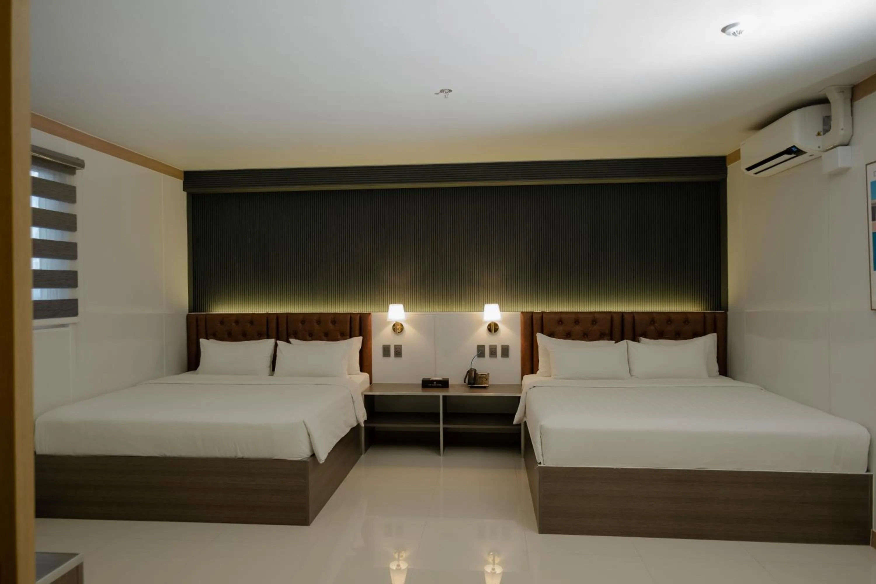 Bed in THE TIMES HOTEL