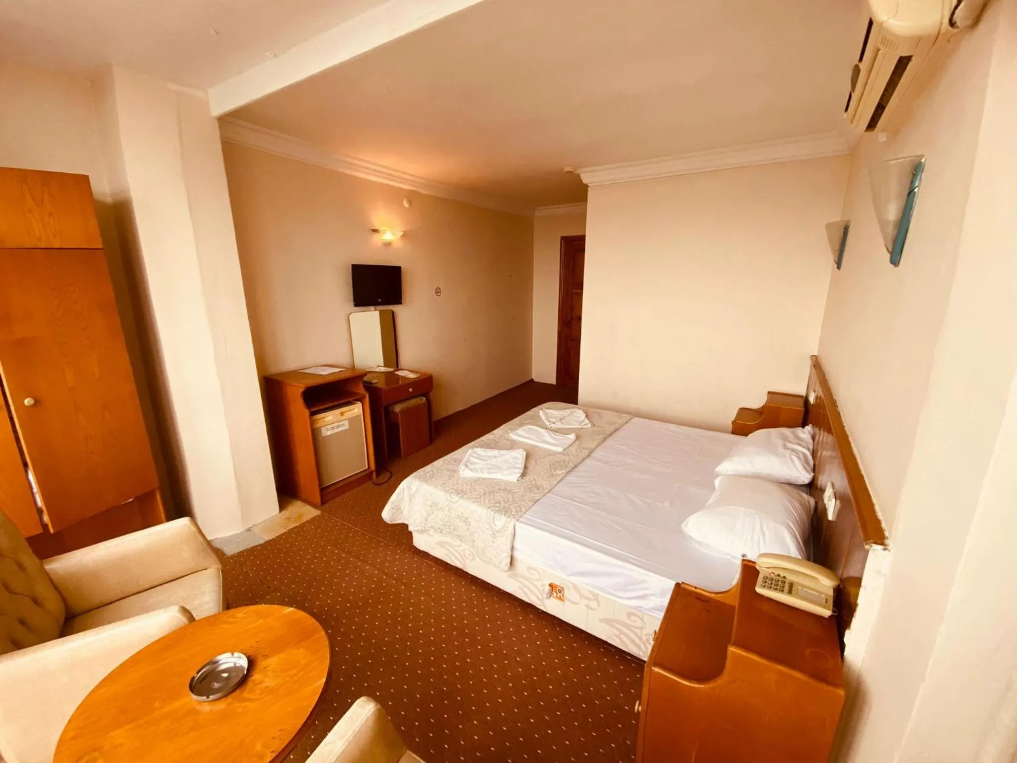 Bed in SANCAK HOTEL