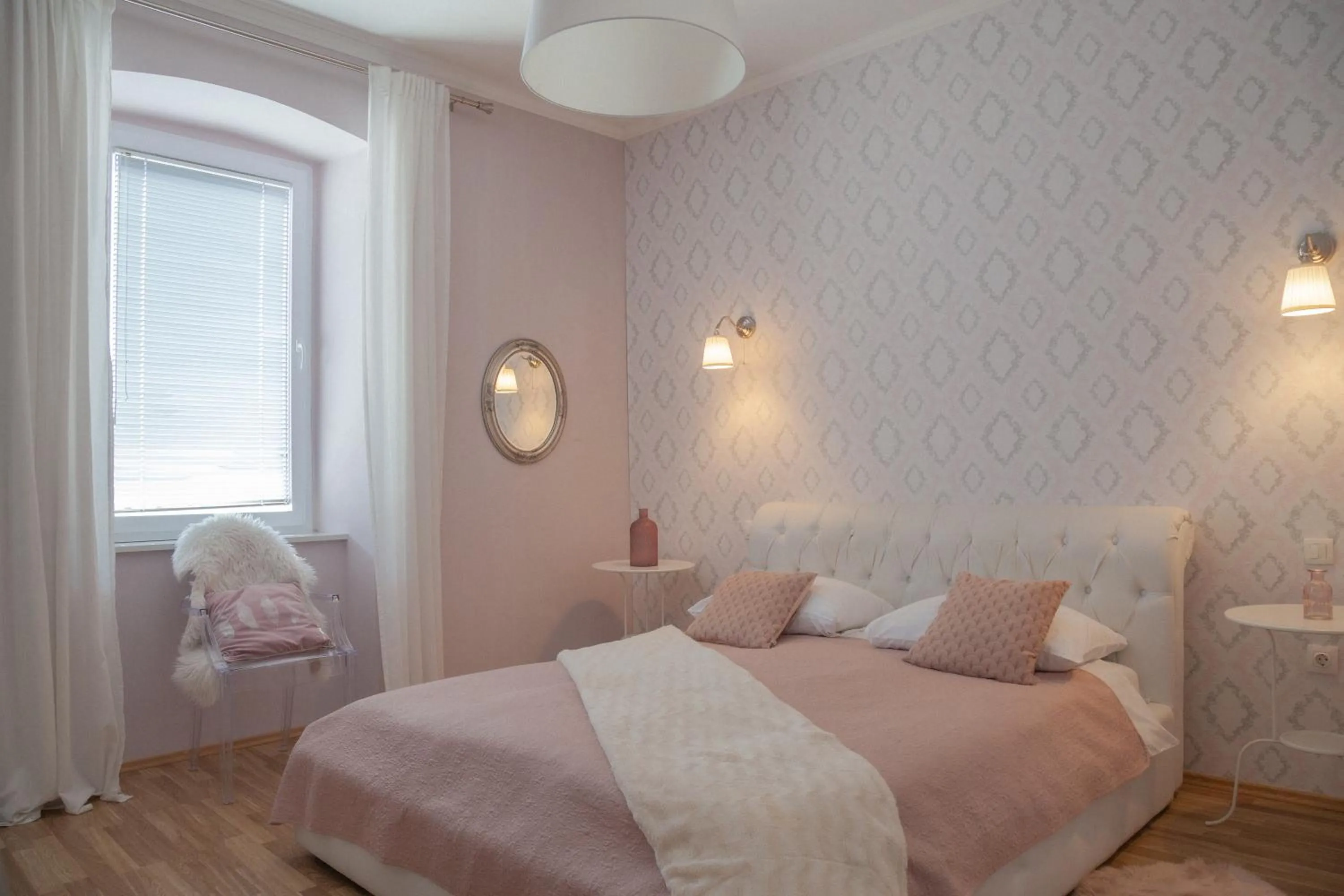 Bed in Captain Emo City Apartments