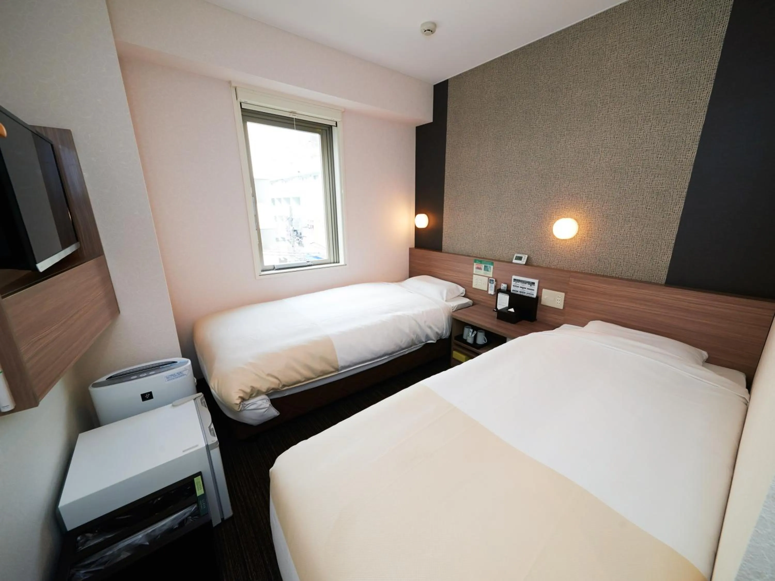 Bed in Super Hotel Shinjuku Kabukicho