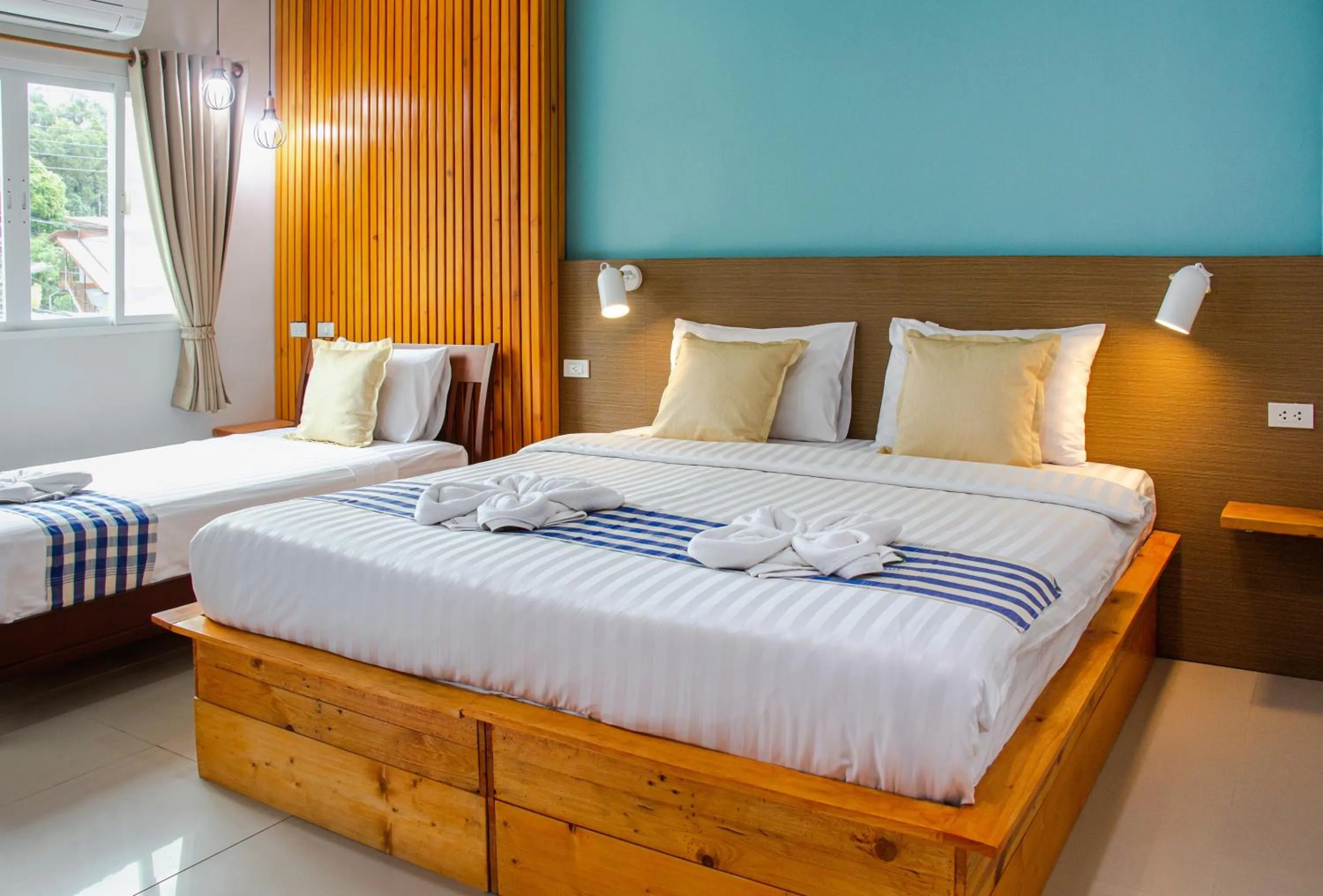 Bed in Kamala Beach Residence
