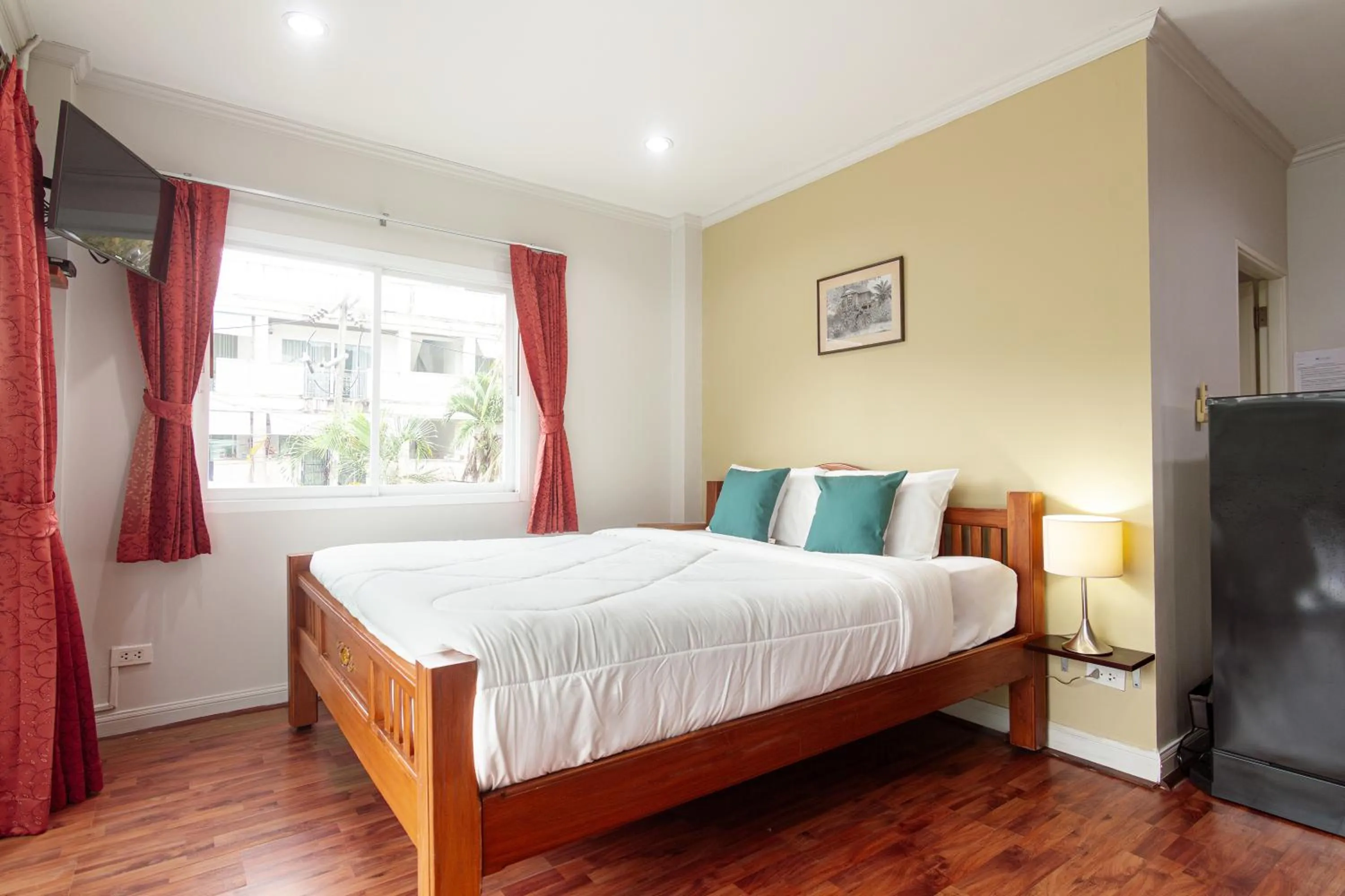 Bed in Kamala Beach Residence