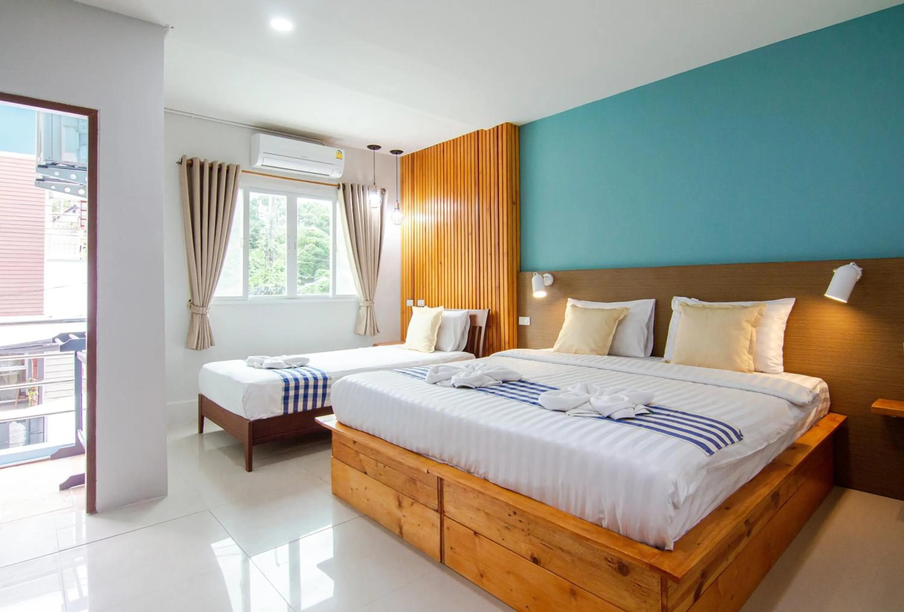 Bed in Kamala Beach Residence