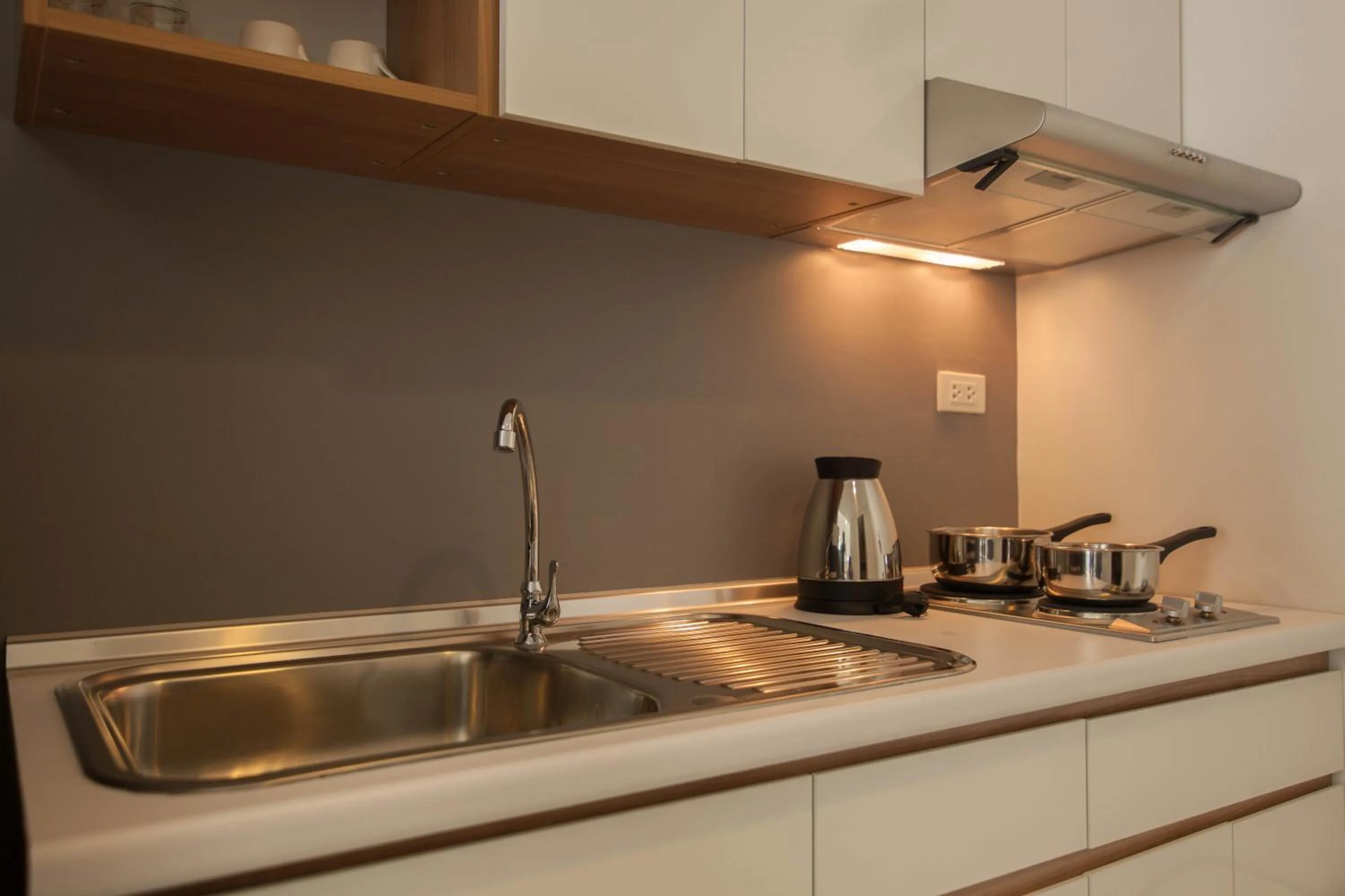 Kitchen or kitchenette in Racha Residence