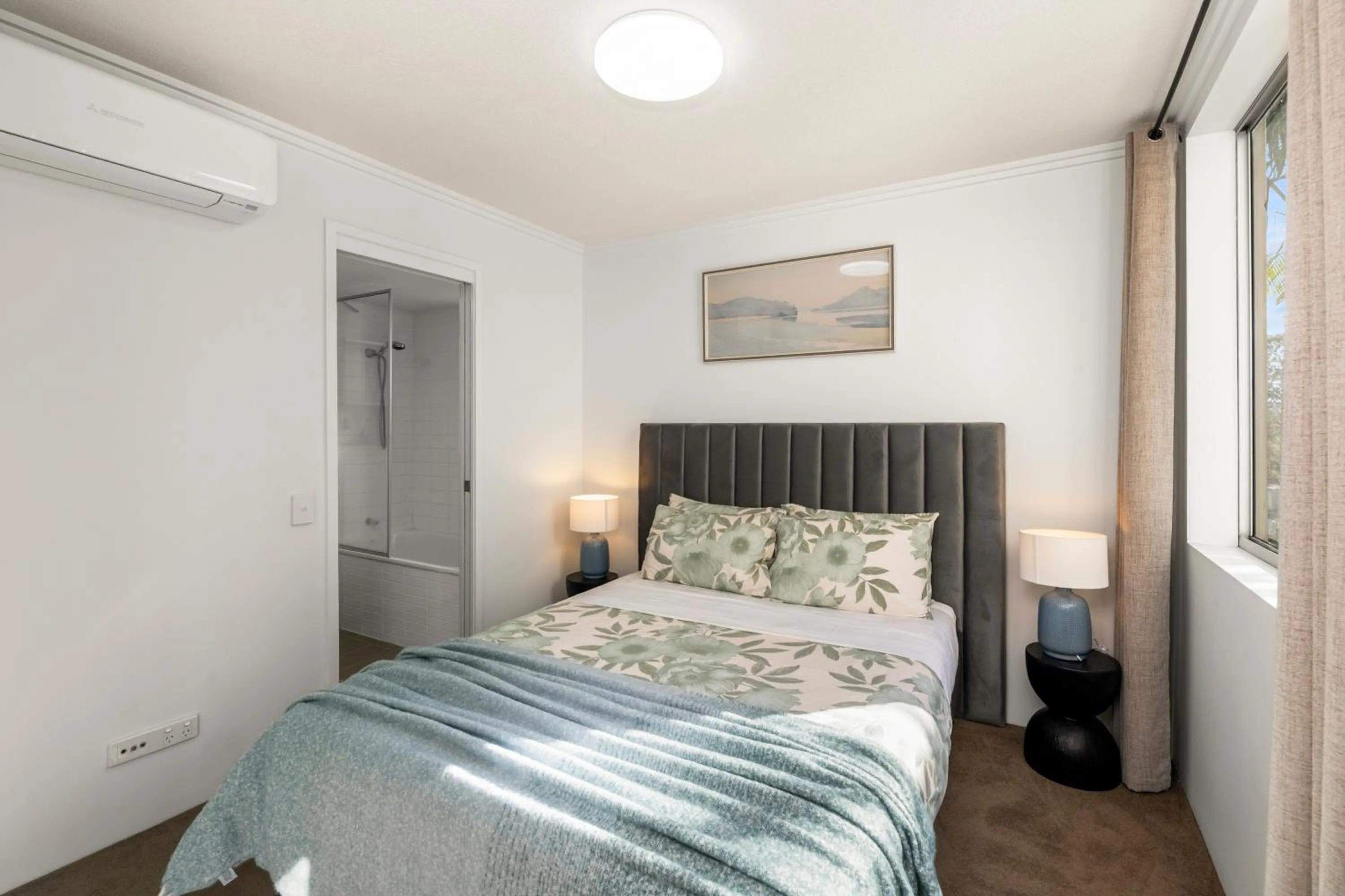 Bed in Allegro Apartments