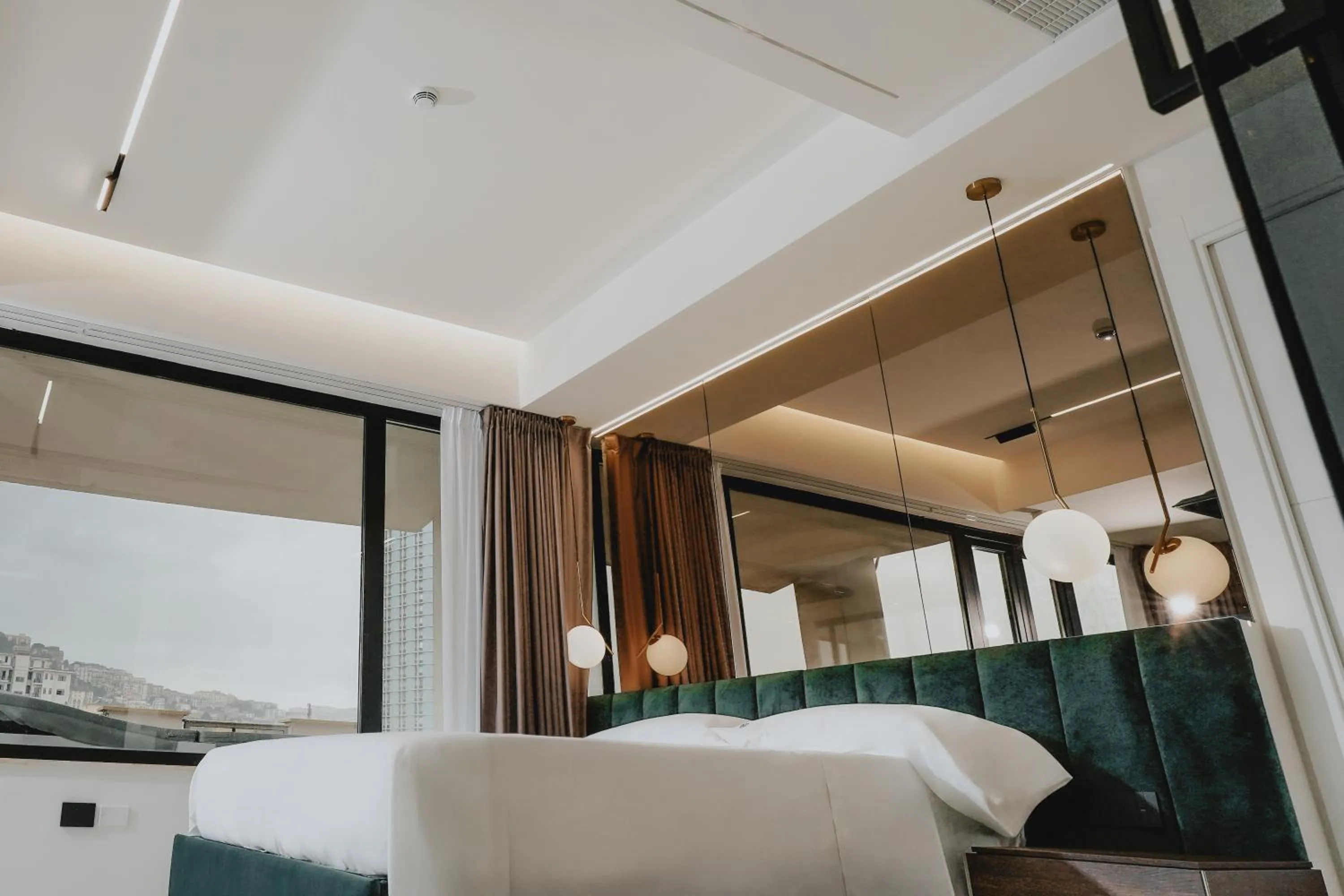 Bed in POETICA BOUTIQUE SKY HOTEL