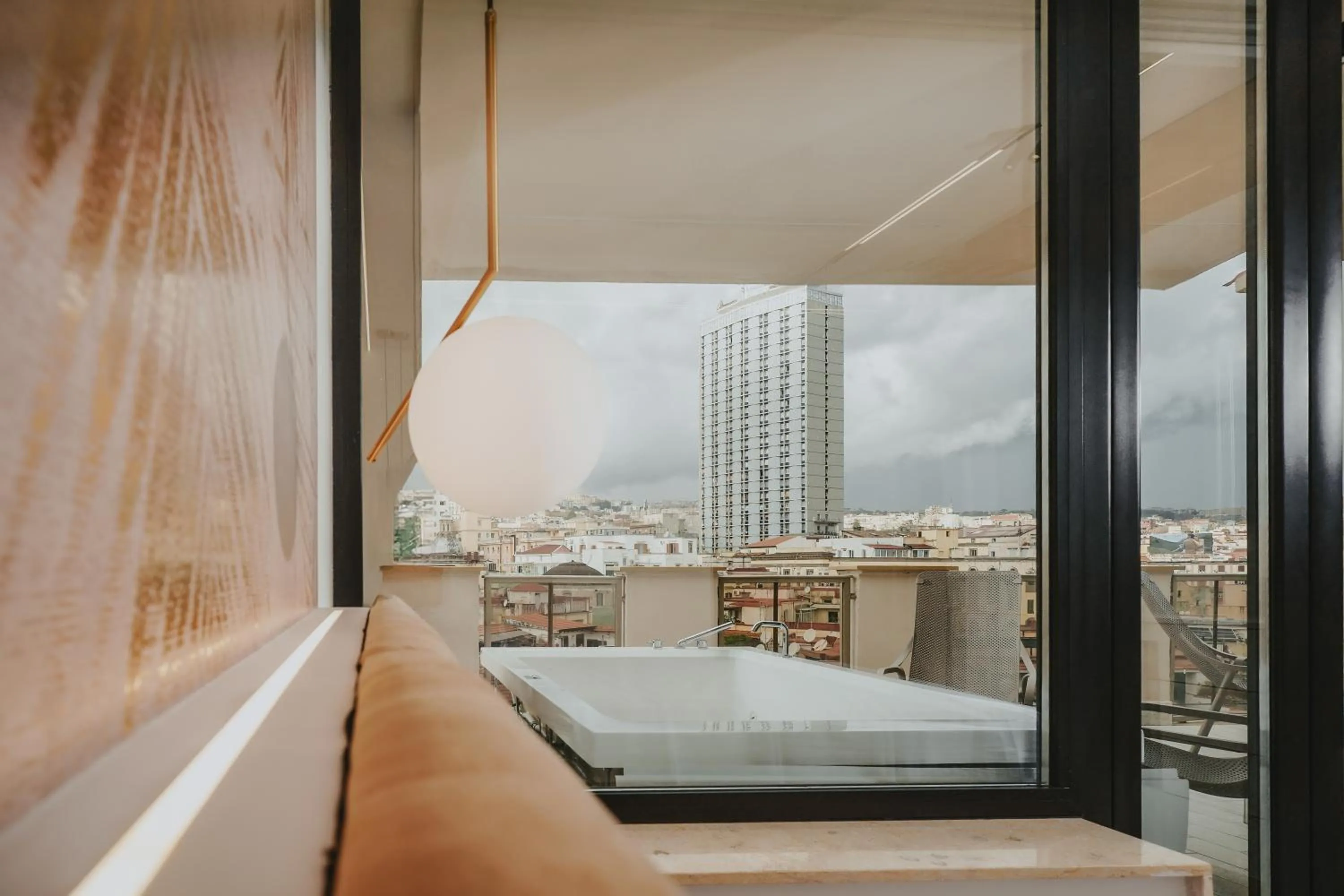 Bed in POETICA BOUTIQUE SKY HOTEL