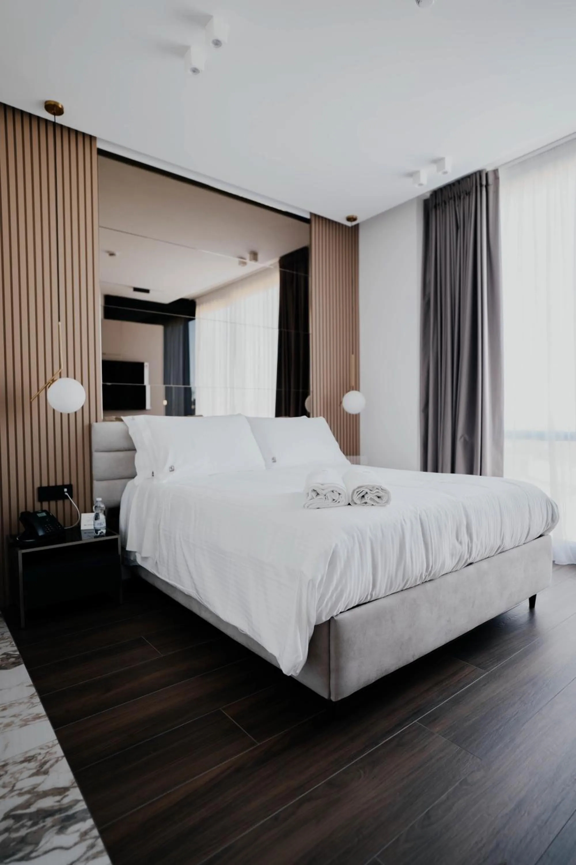 Bed in POETICA BOUTIQUE SKY HOTEL