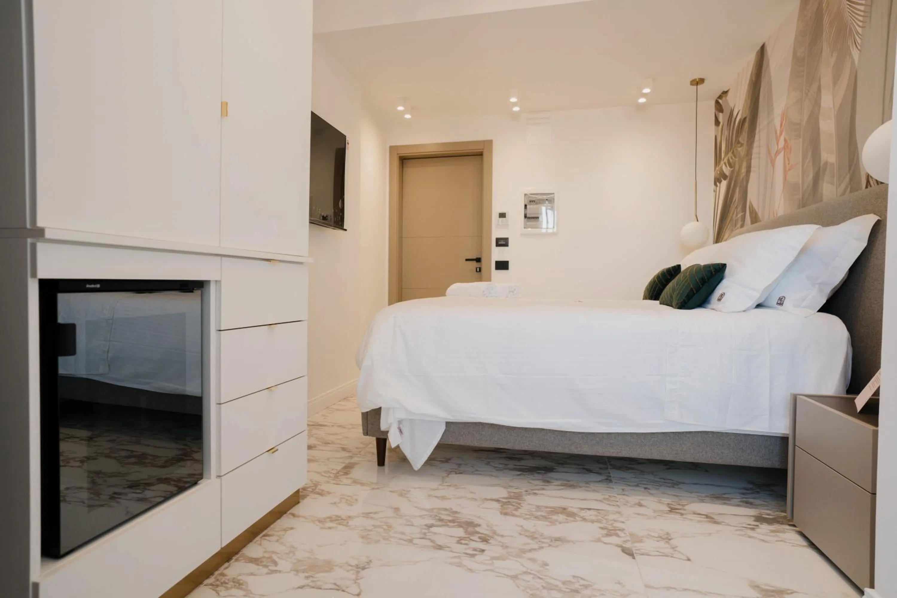 Bed in POETICA BOUTIQUE SKY HOTEL