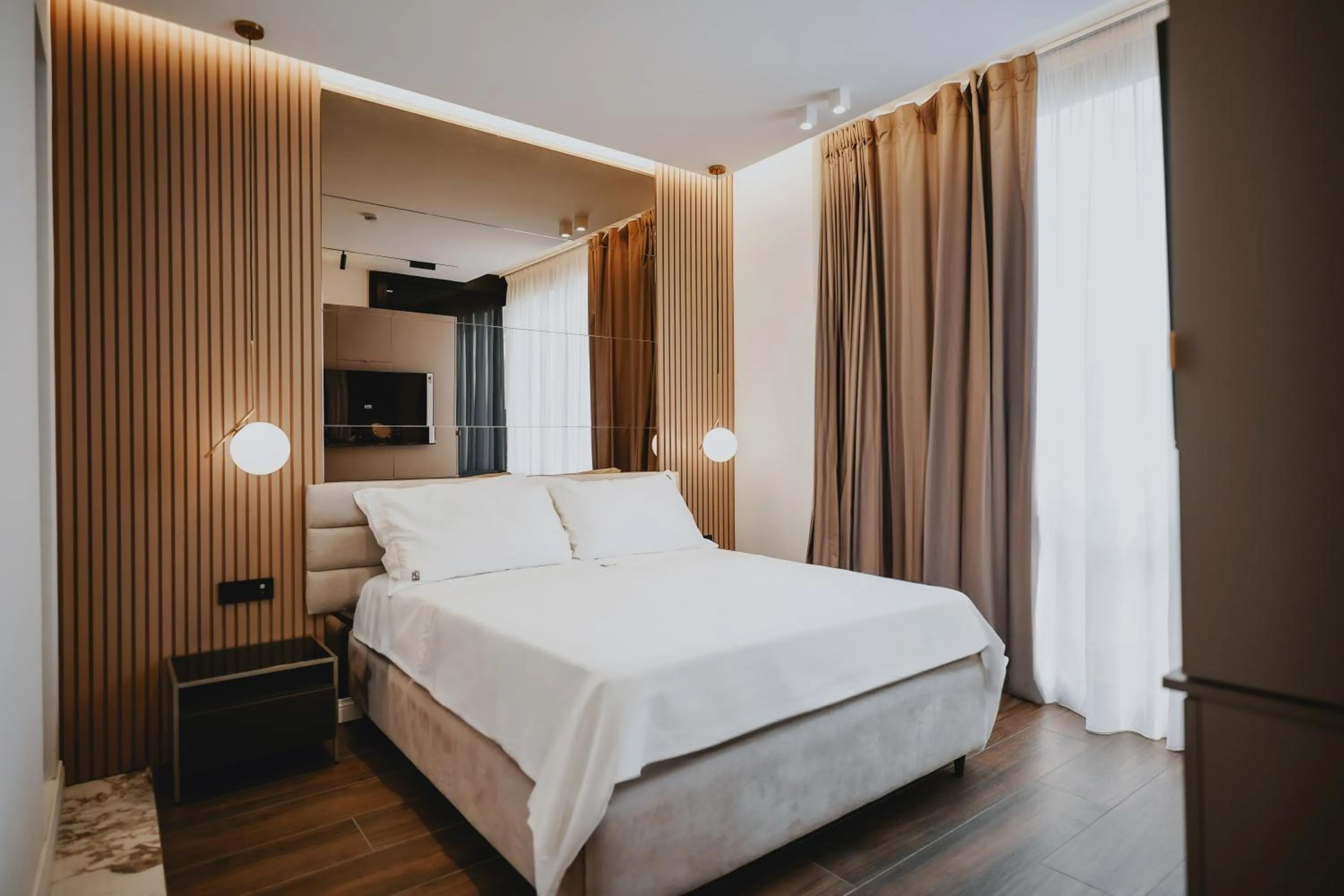 Bed in POETICA BOUTIQUE SKY HOTEL