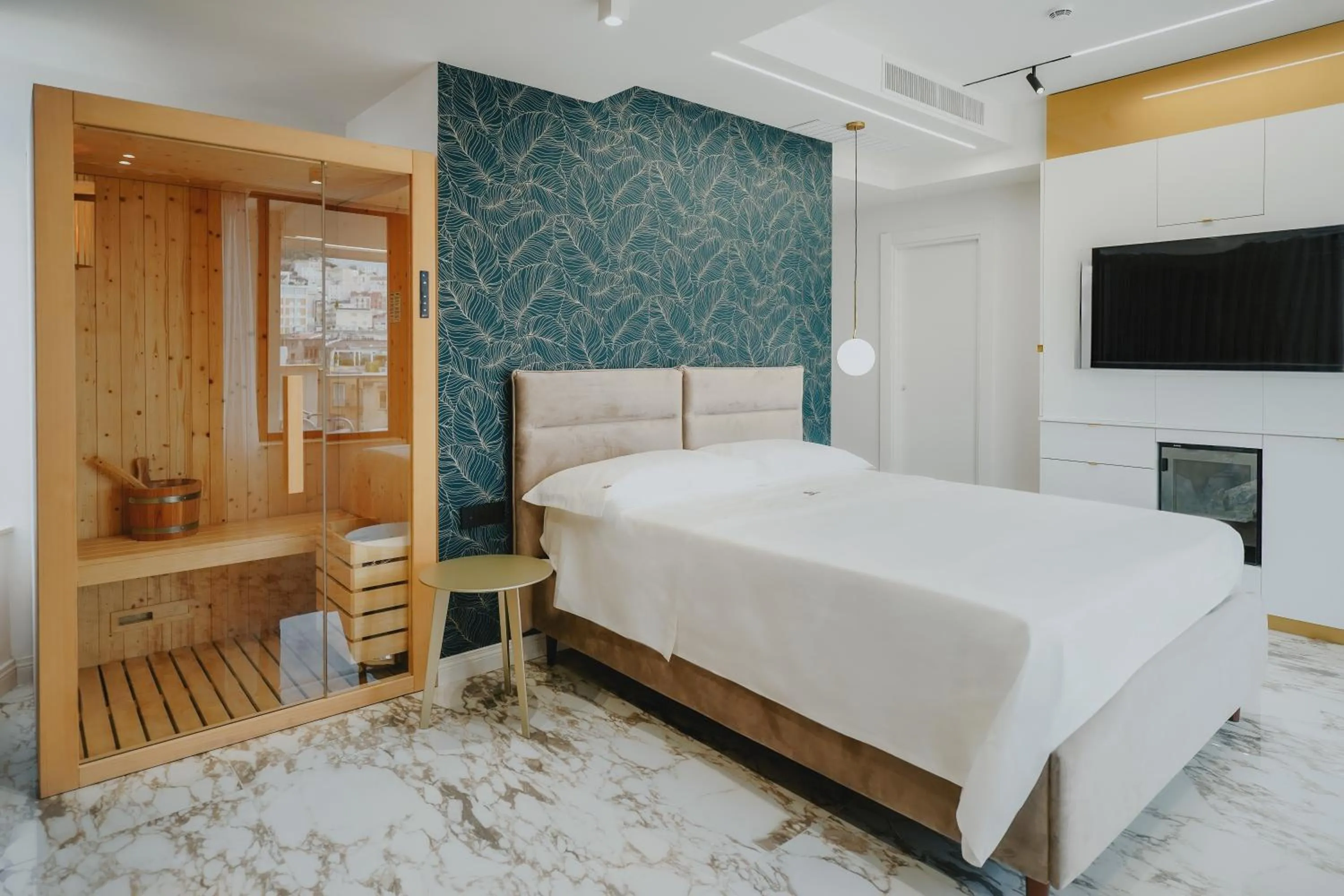 Bed in POETICA BOUTIQUE SKY HOTEL