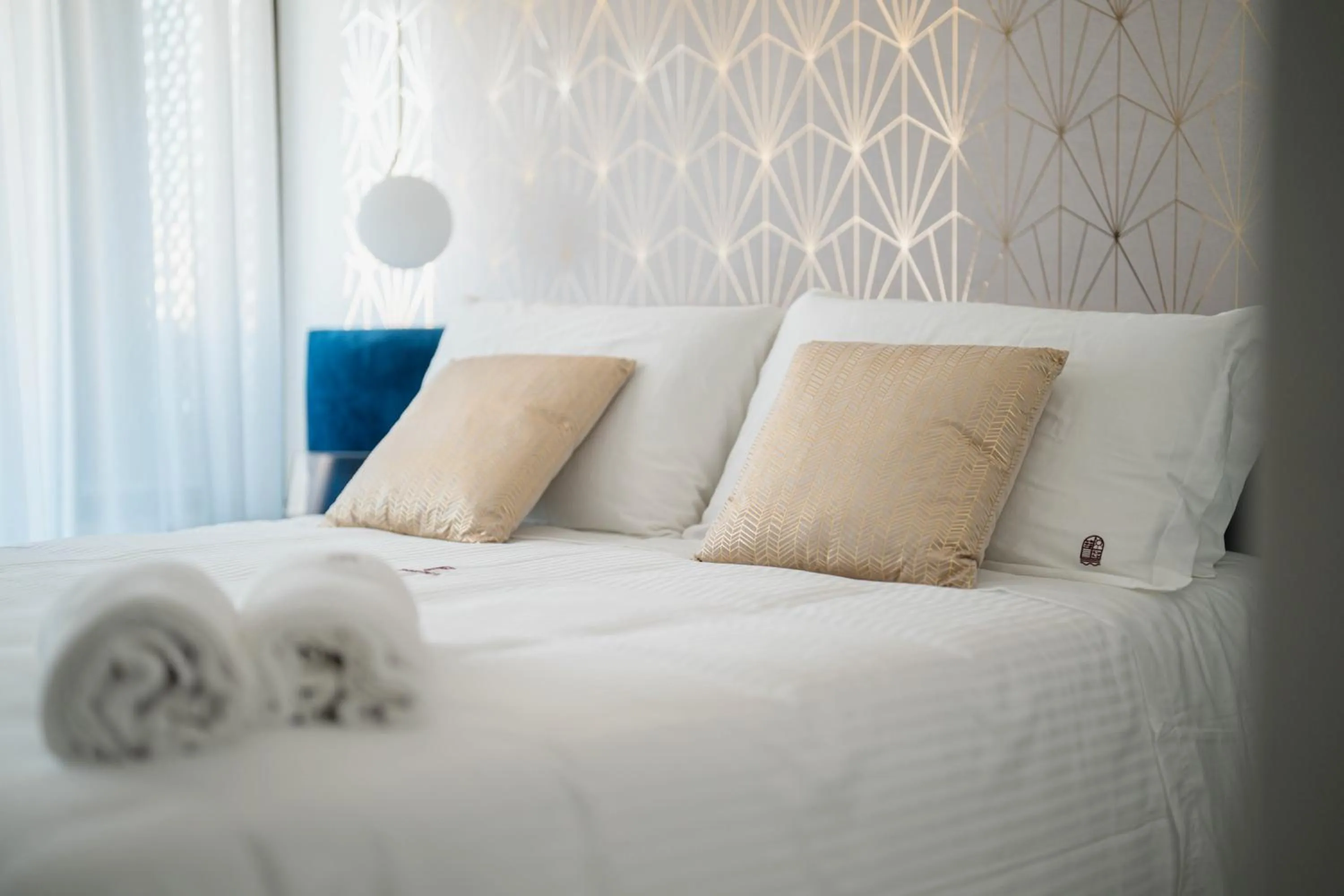 Bed in POETICA BOUTIQUE SKY HOTEL