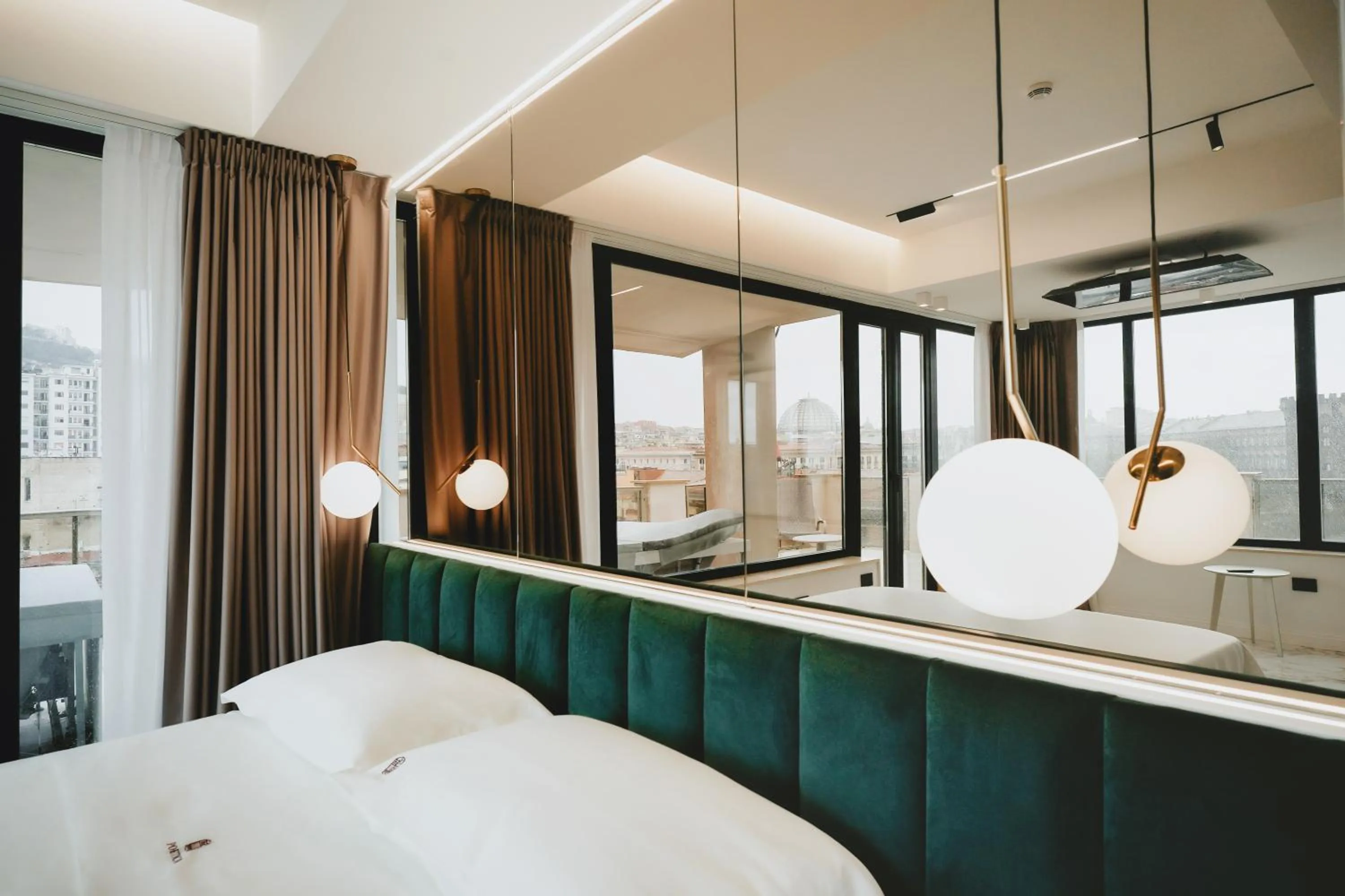 Bed in POETICA BOUTIQUE SKY HOTEL