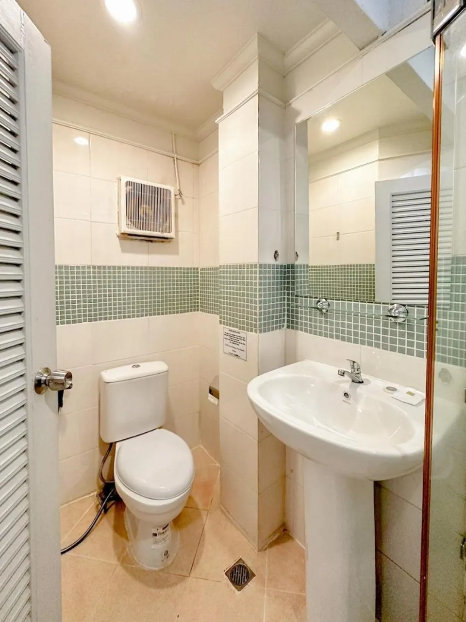 Toilet in Thrive Hotel