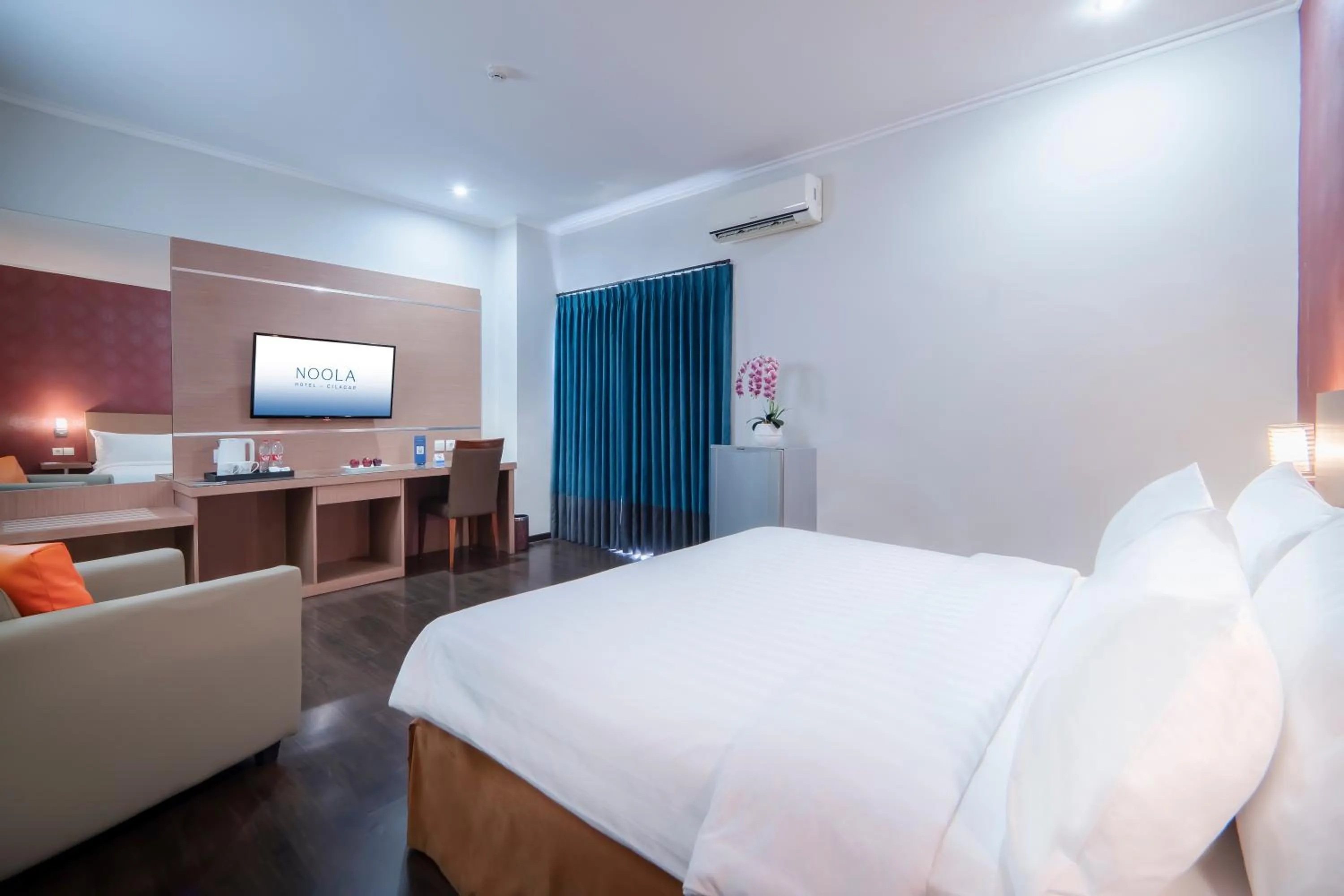 Bed in Noola Hotel Cilacap