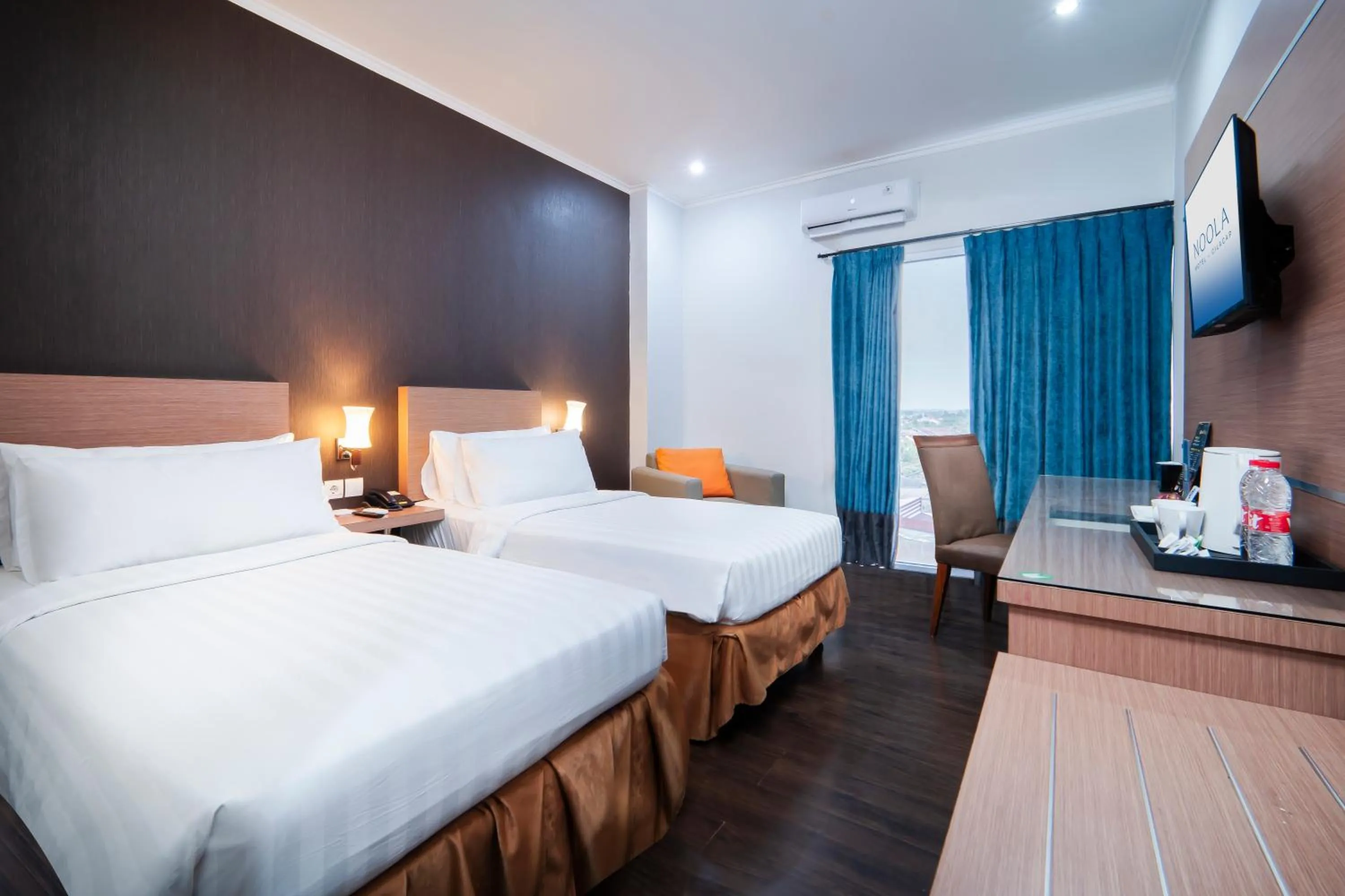 Bed in Noola Hotel Cilacap