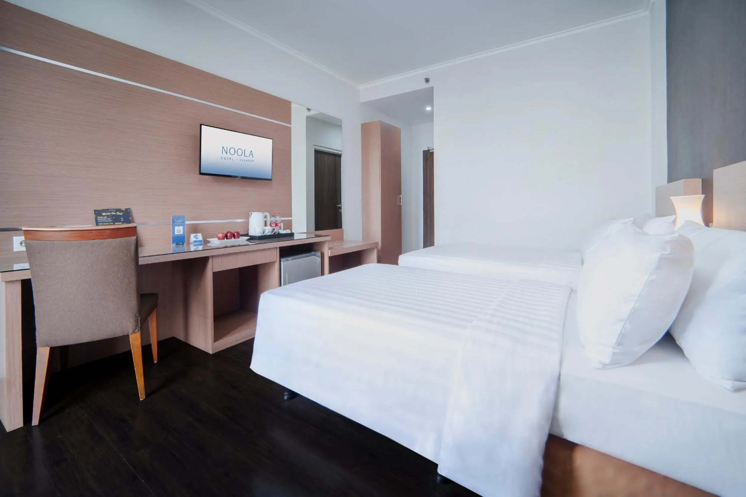 Bed in Noola Hotel Cilacap