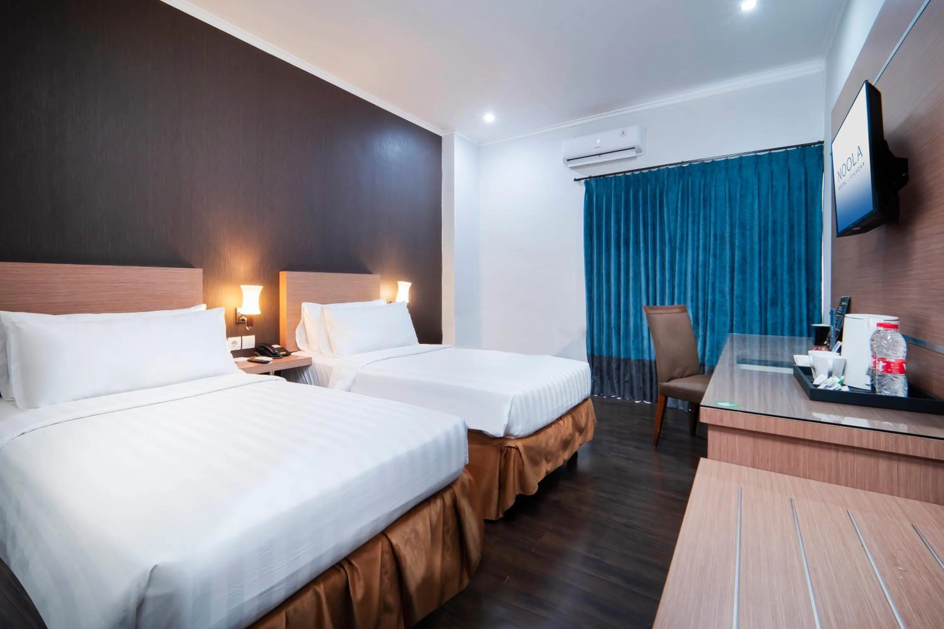 Bed in Noola Hotel Cilacap