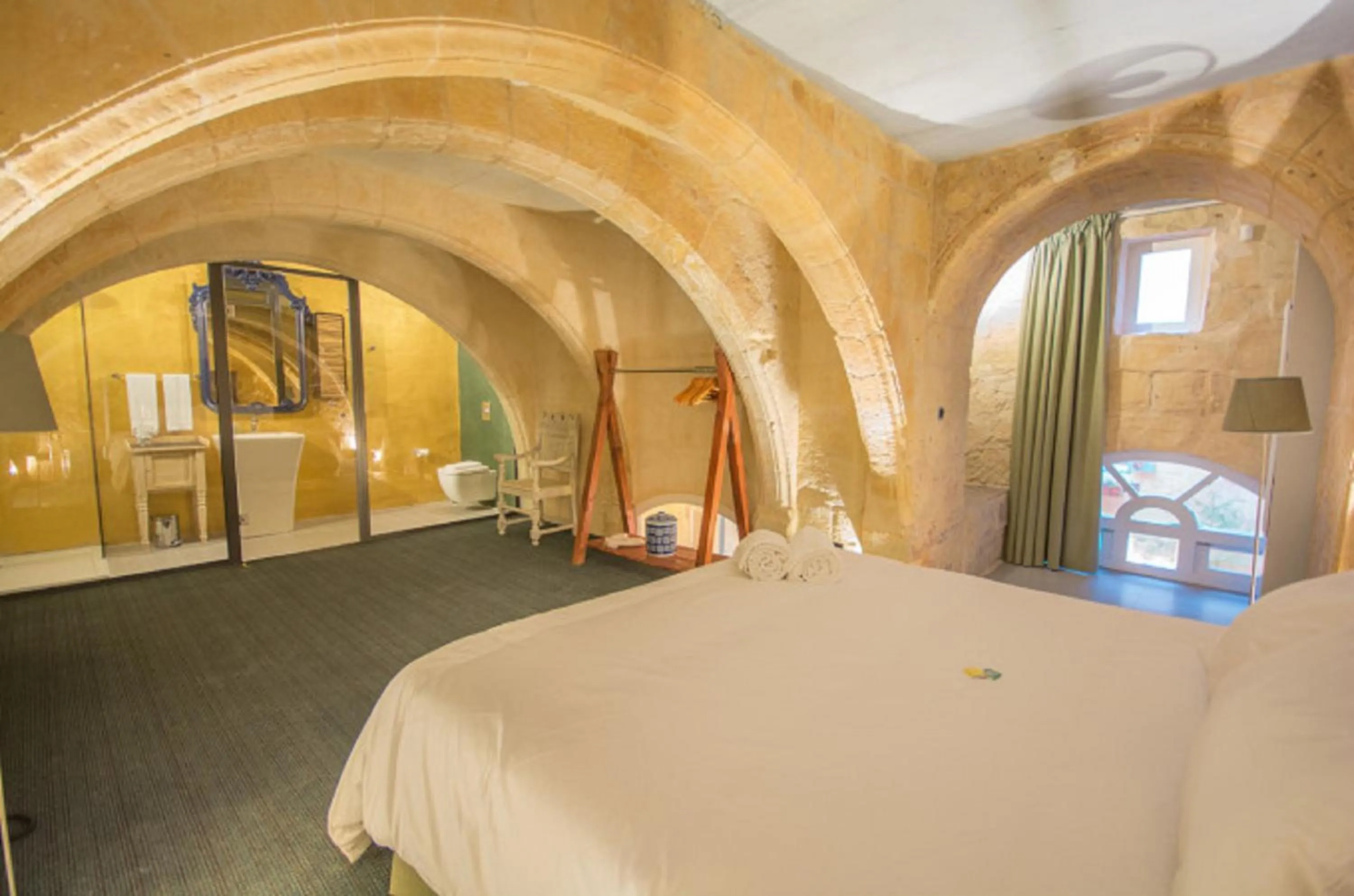 Bedroom in The Vincent Boutique Suites