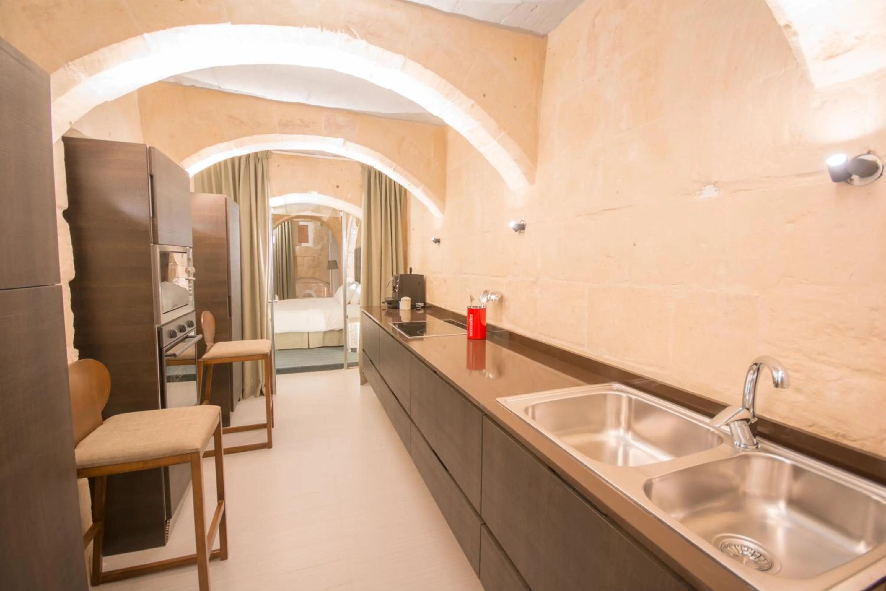 Kitchen or kitchenette in The Vincent Boutique Suites