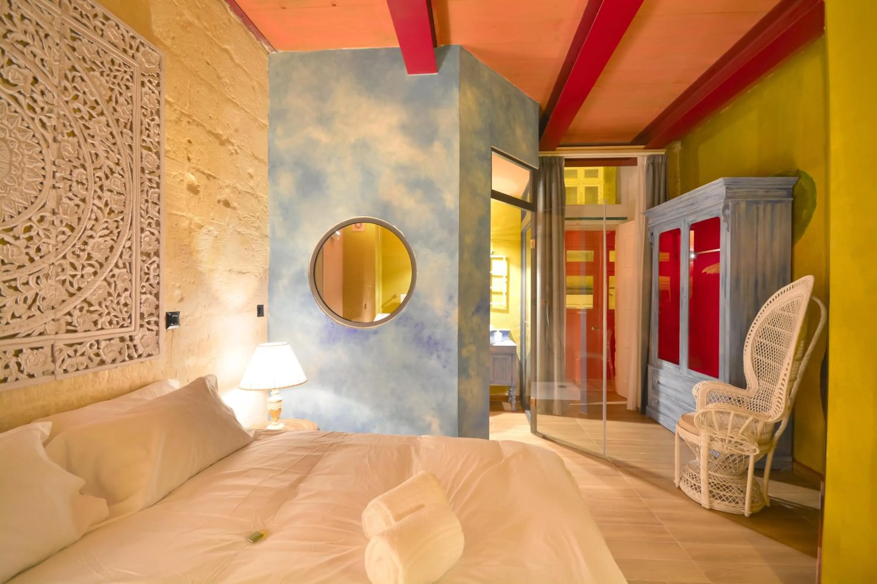 Bed in The Vincent Boutique Suites