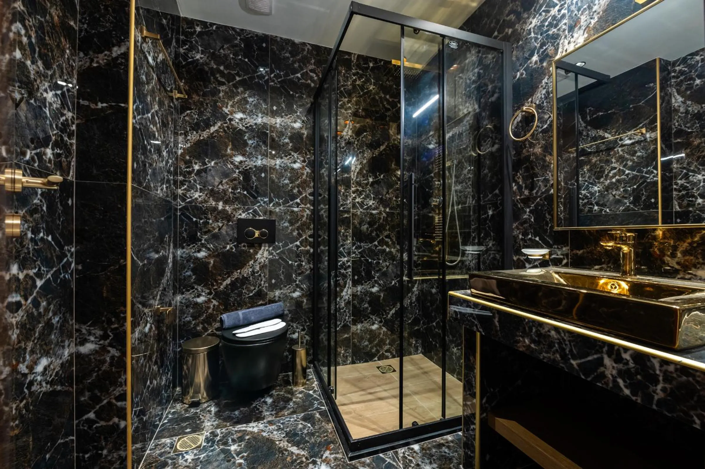 Shower in Royal Gold City Suites by Omilos Hotels