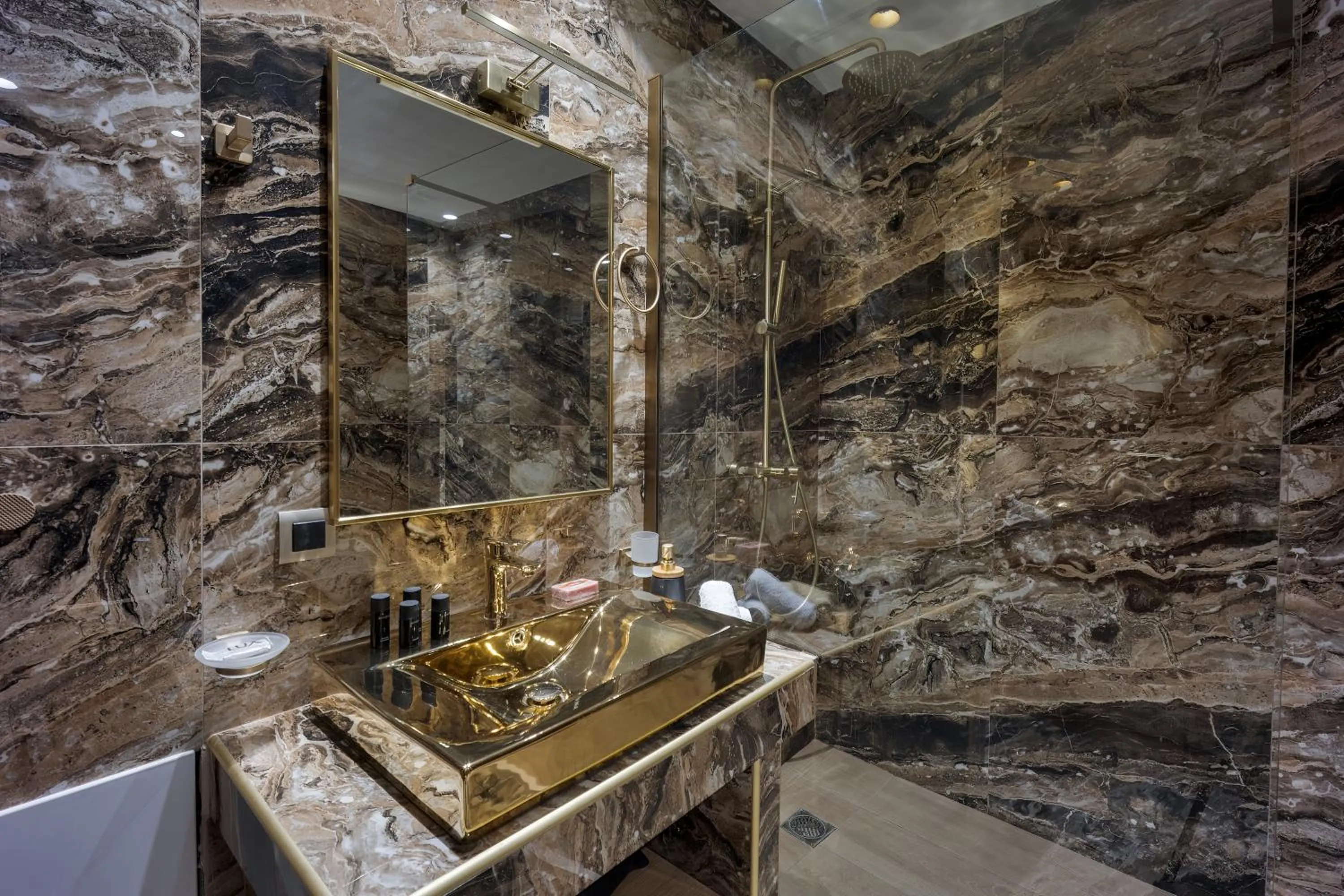 Shower in Royal Gold City Suites by Omilos Hotels