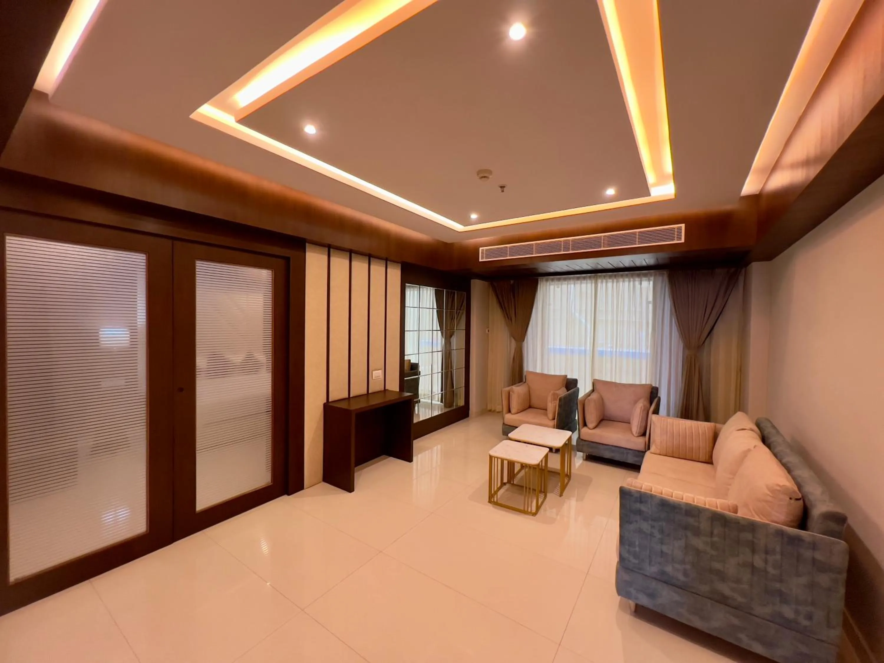 Seating area, Bed in HOTEL PRAJYOT