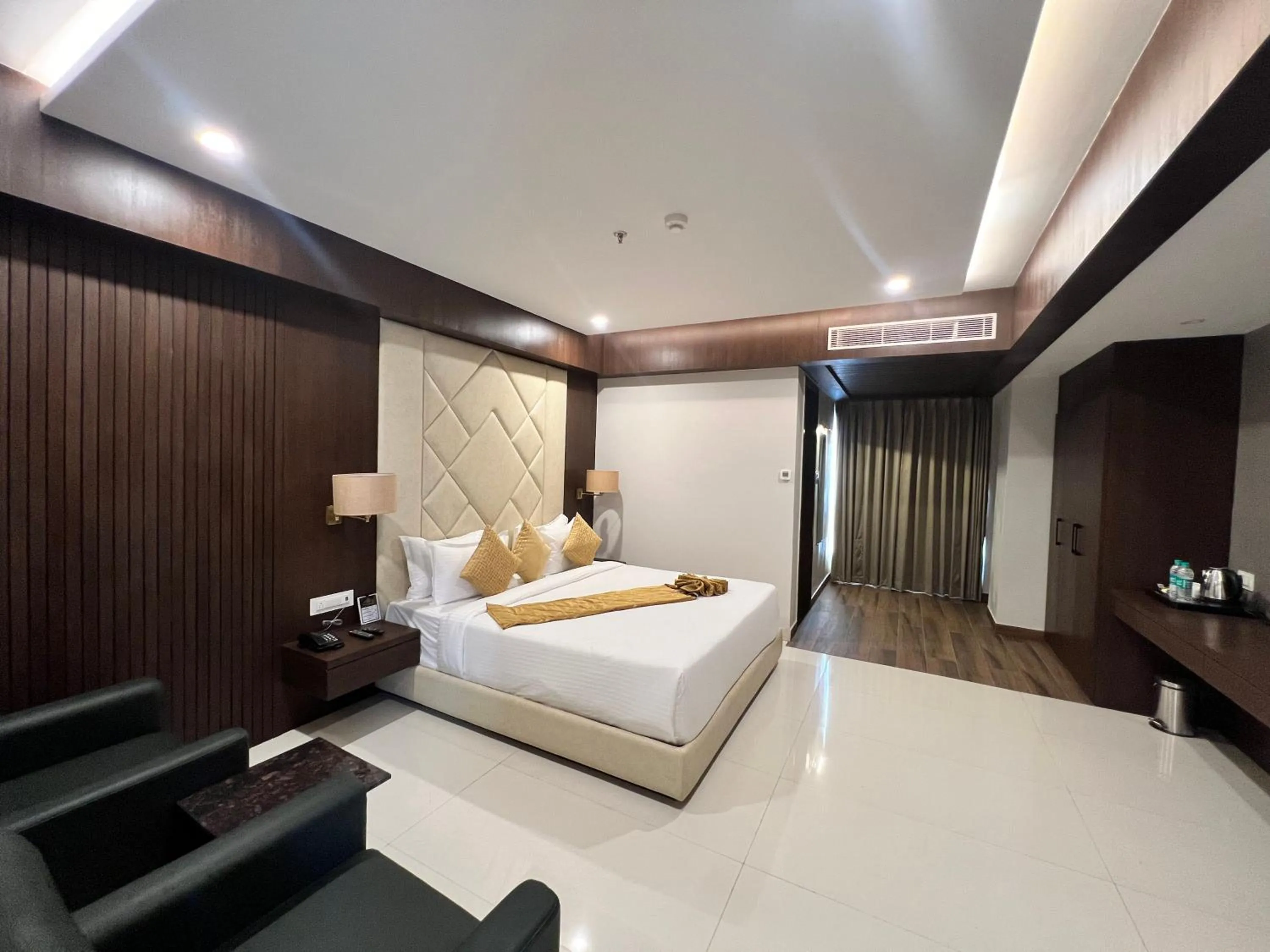 Photo of the whole room, Bed in HOTEL PRAJYOT