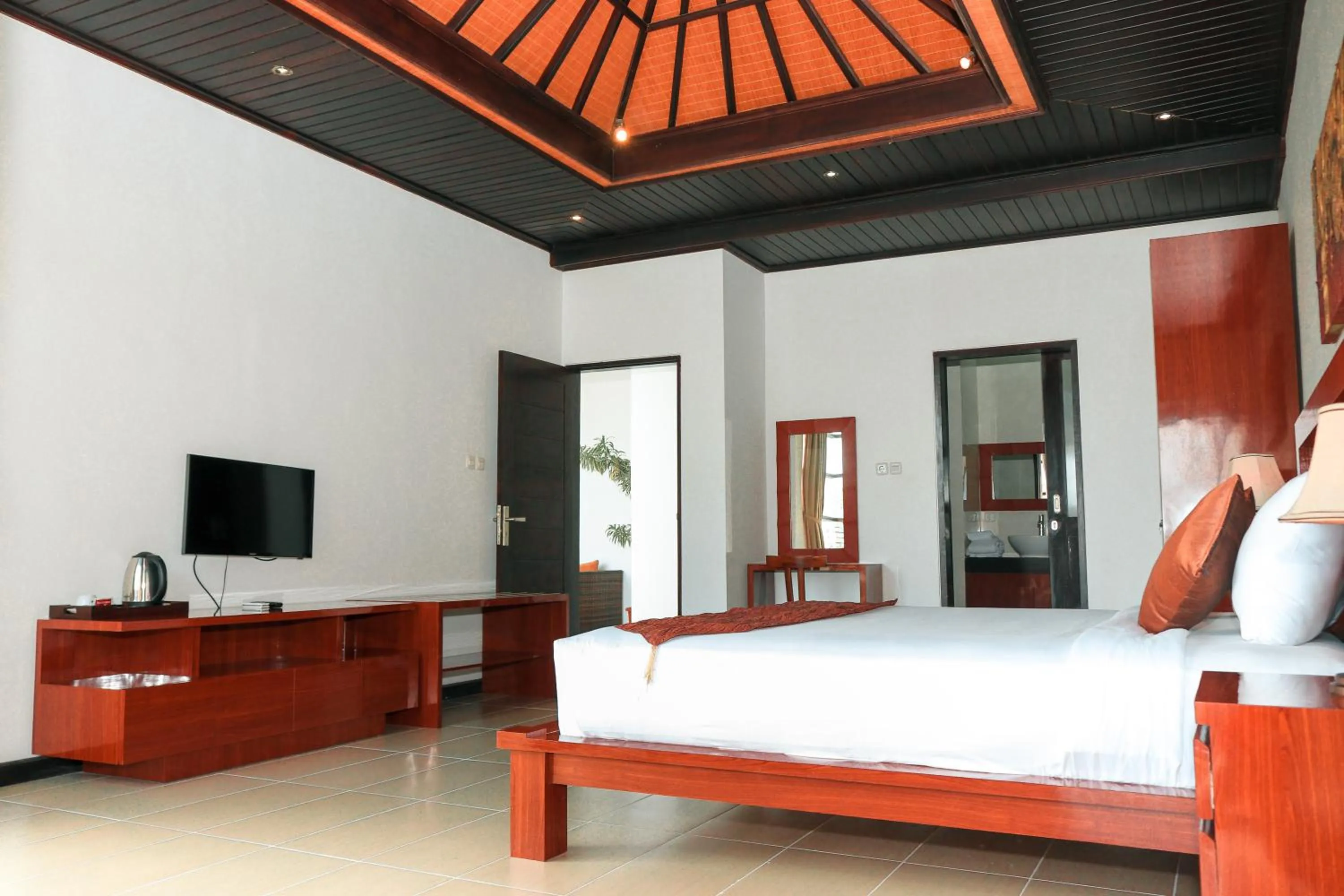 Communal lounge/ TV room, Bed in Argya Santi Suite and Villas