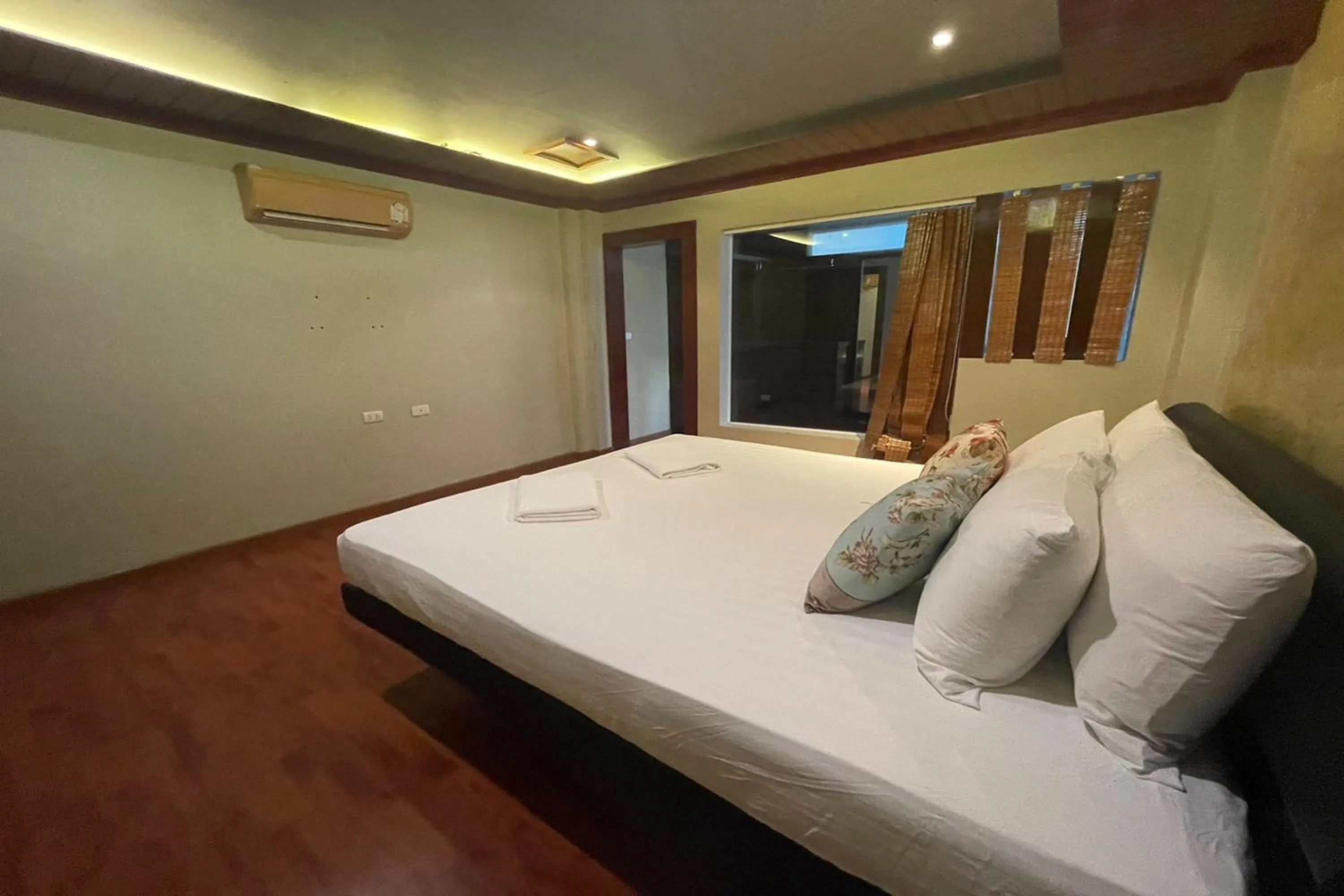 Bed in Landmark Patong Hotel