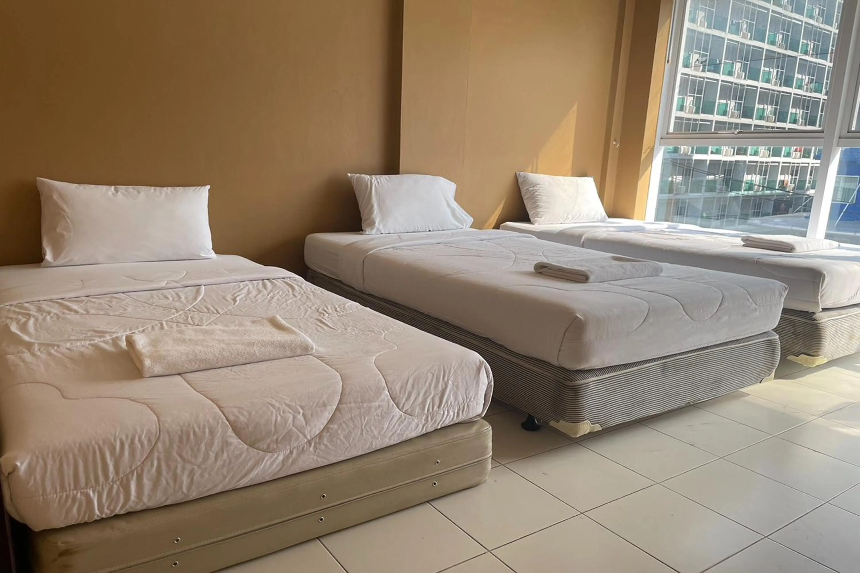 Bed in Landmark Patong Hotel