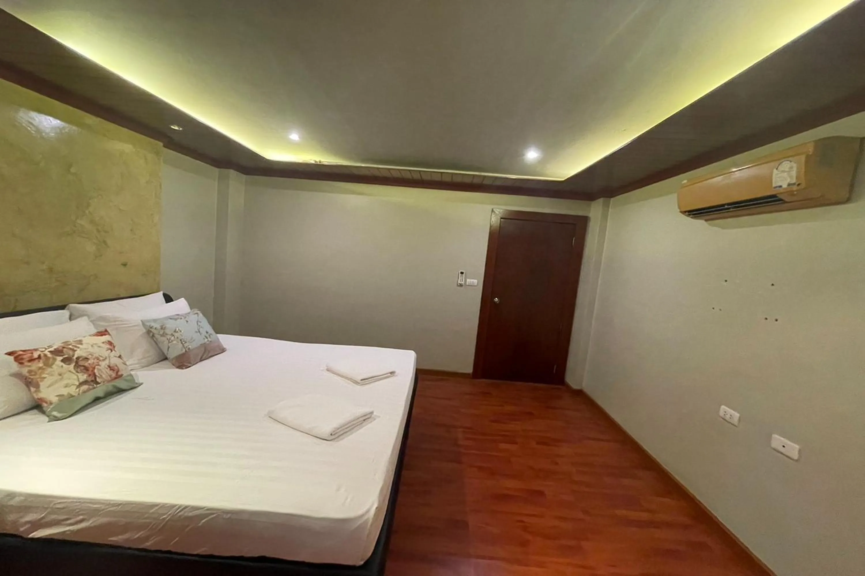 Bed in Landmark Patong Hotel