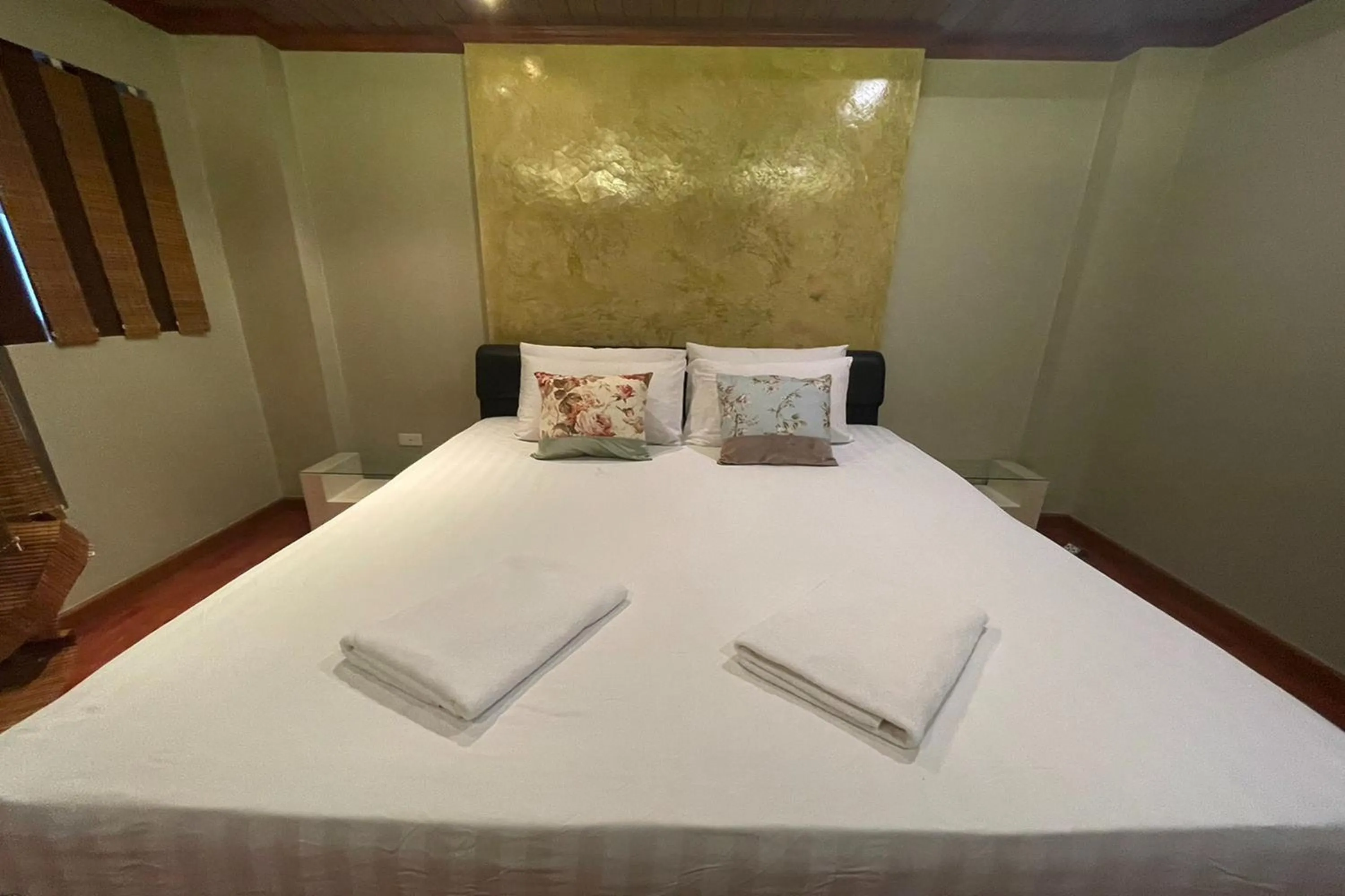 Bed in Landmark Patong Hotel