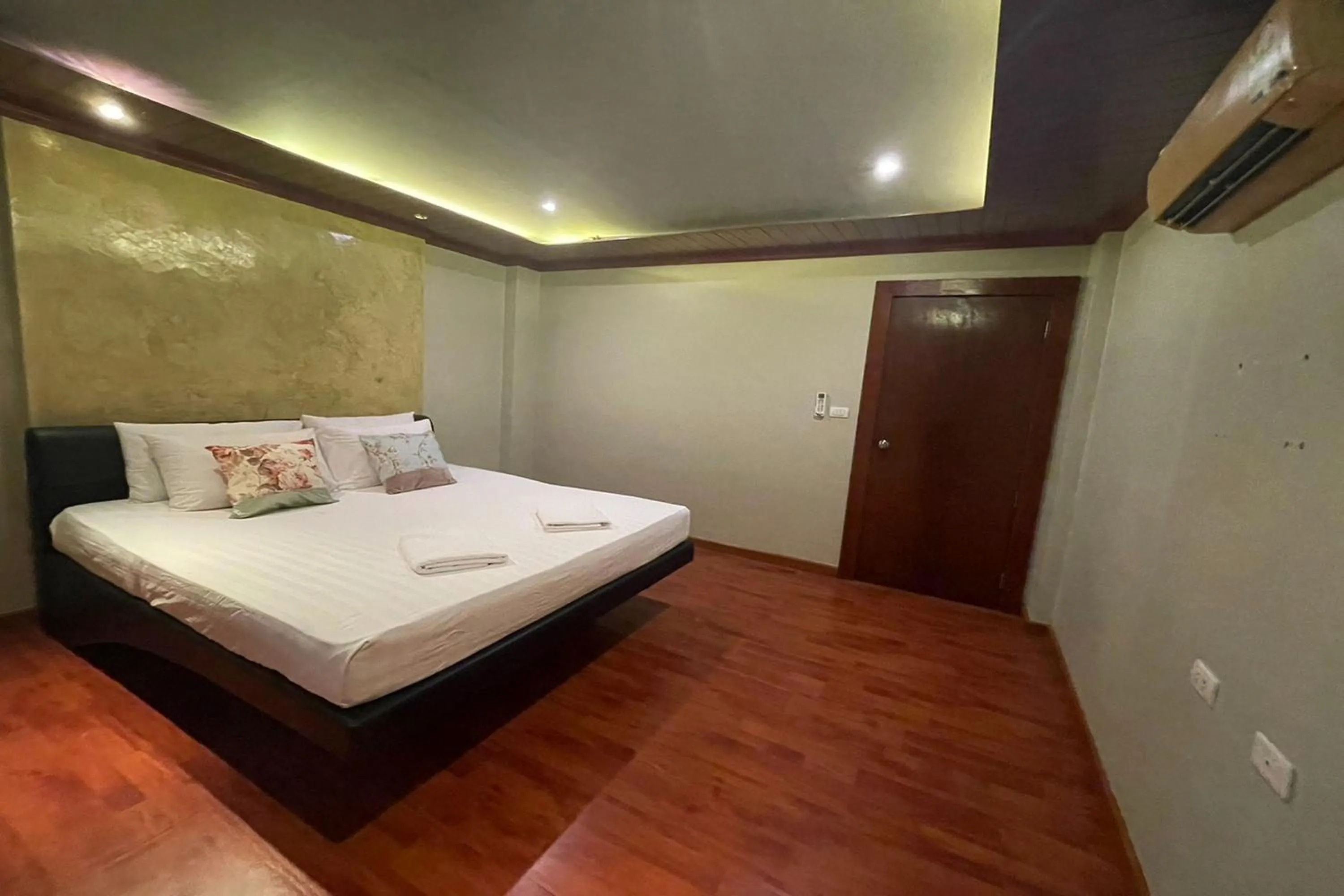 Bed in Landmark Patong Hotel